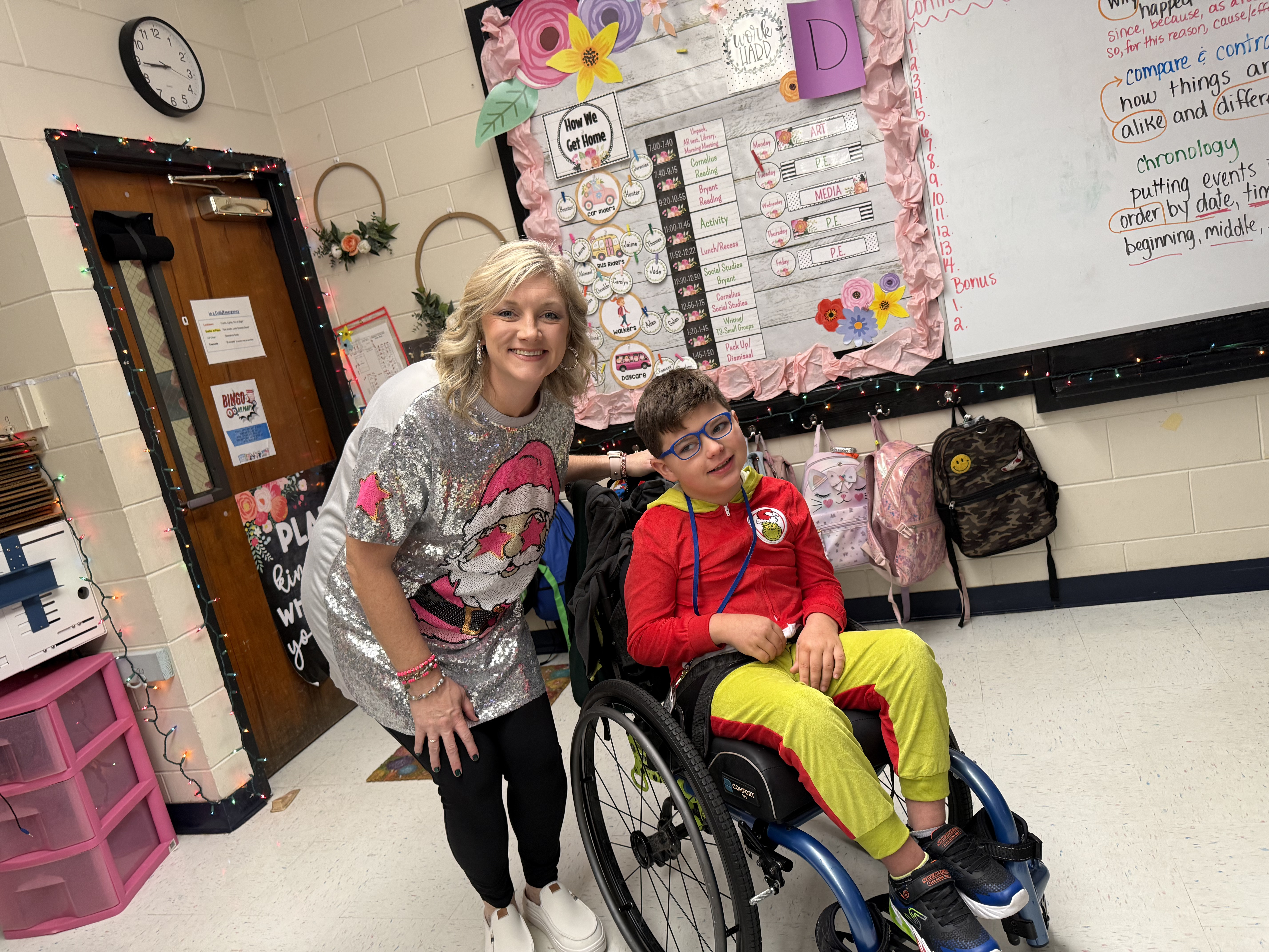 a teacher and student dressed for the holidays