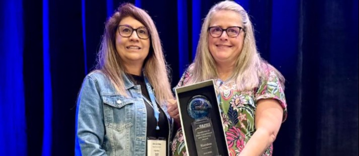 data clerks receiving an award