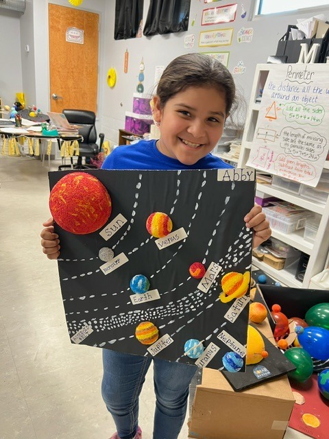 Student showing a science project
