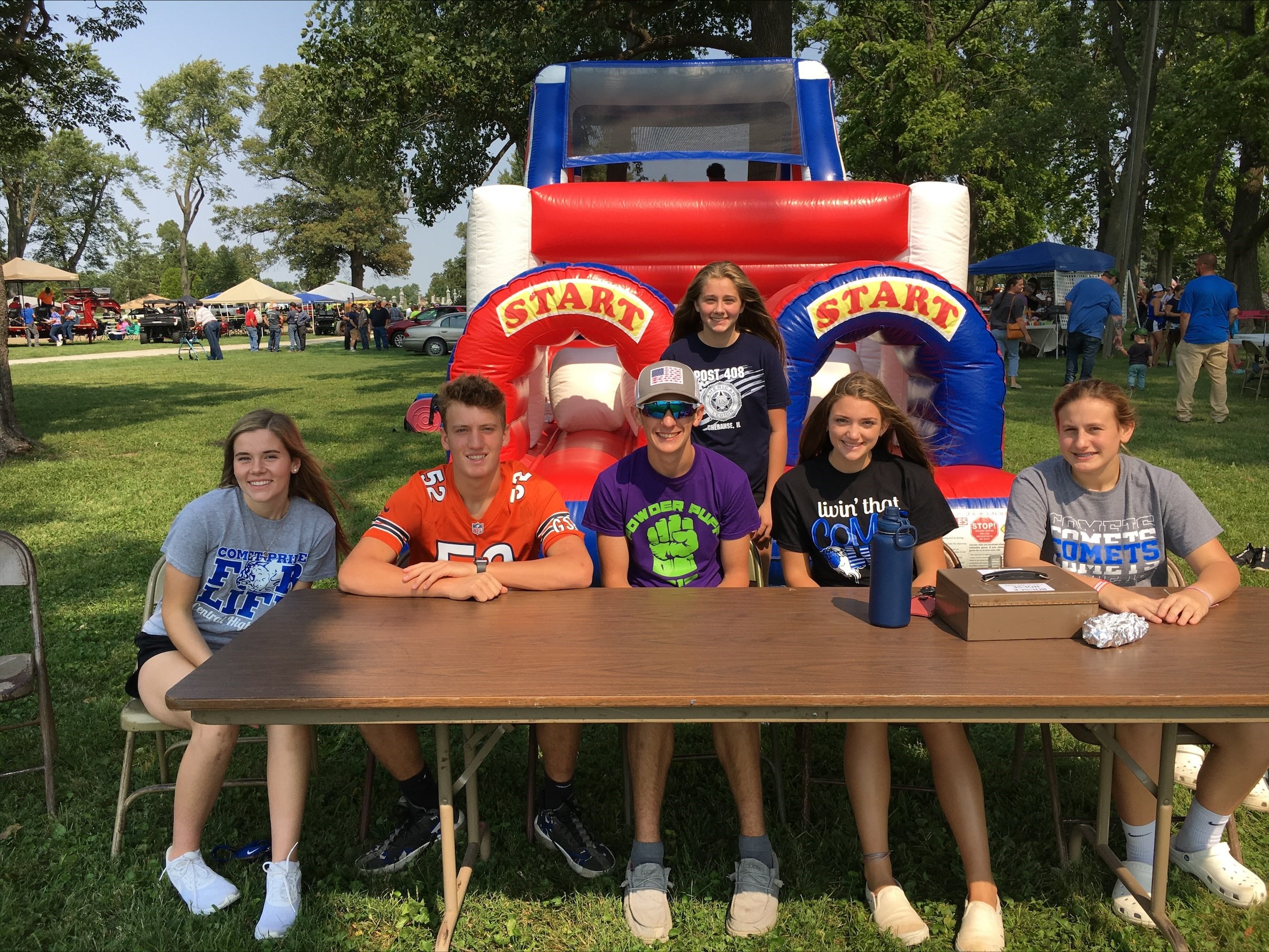 Student council working the inflatables at the Pull in the Park