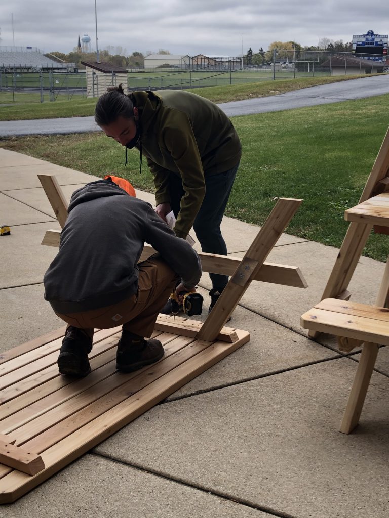 Students making lunch tables