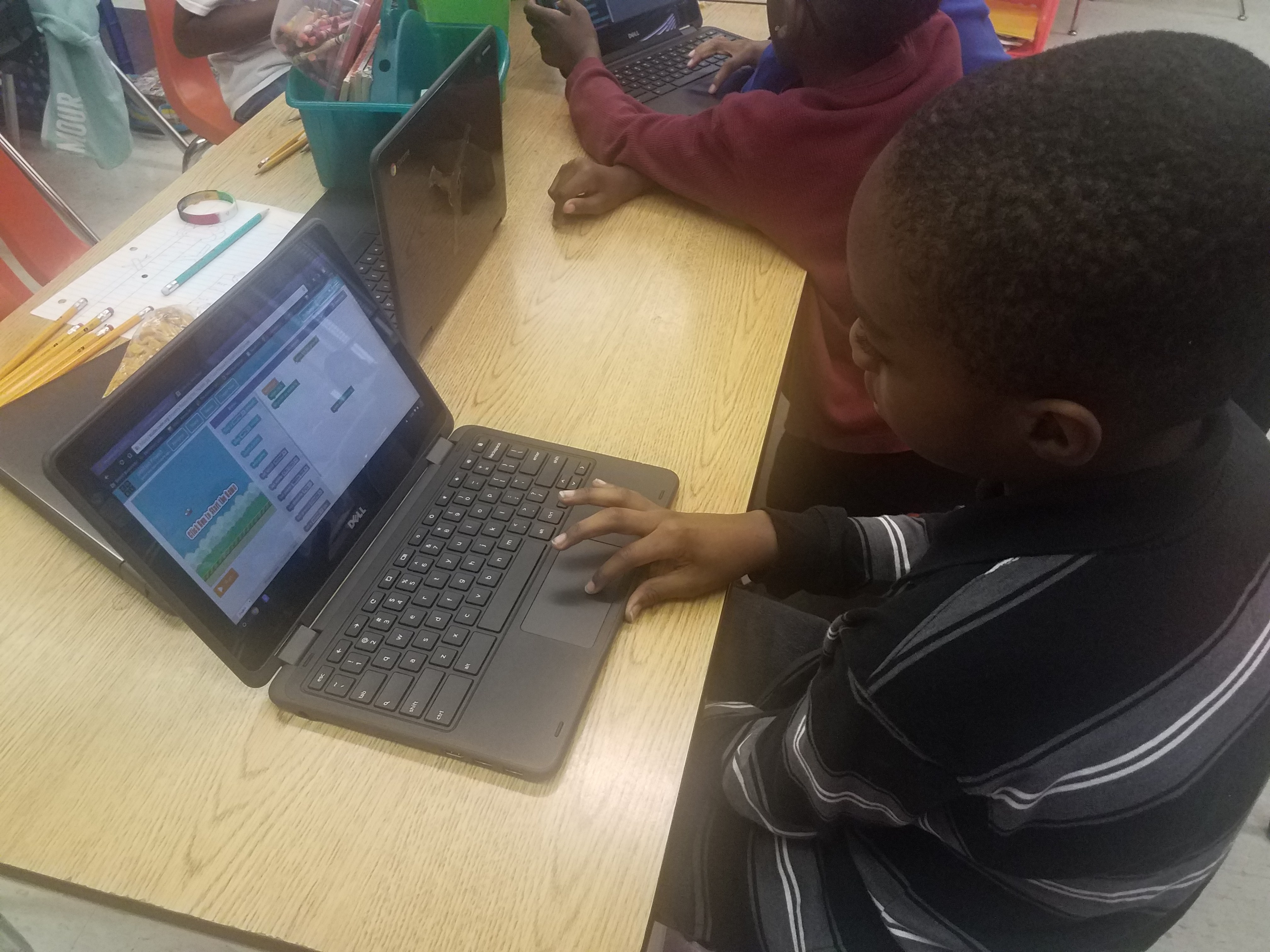 Student working with a laptop