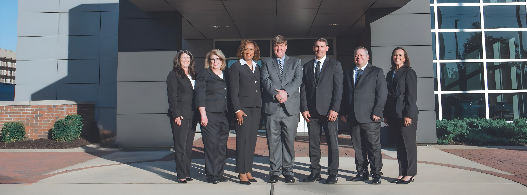 Decatur City Schools Board of Education Members pose outside of Central Office.