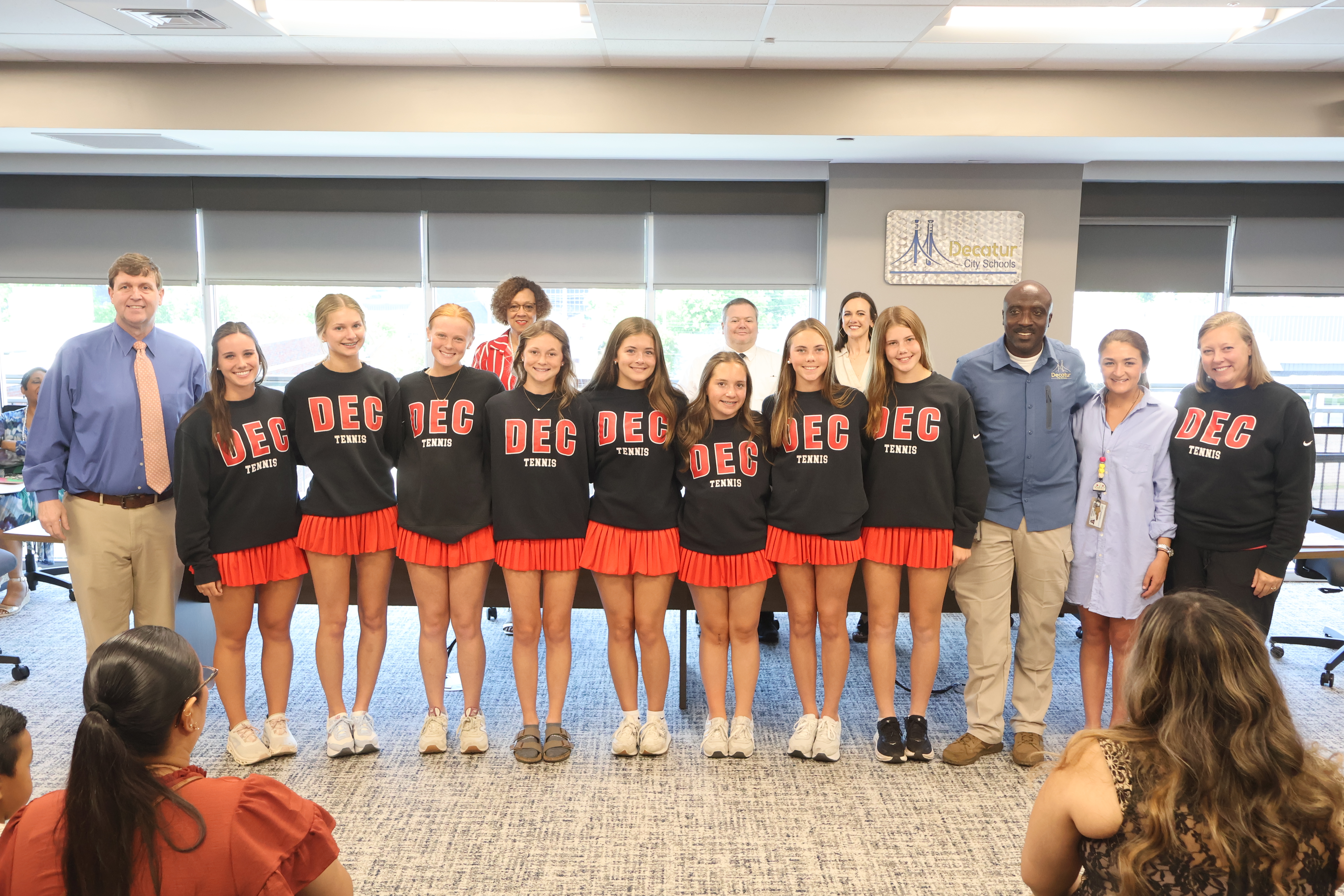 Decatur High School Tennis Team recognized as Decatur Diamond.
