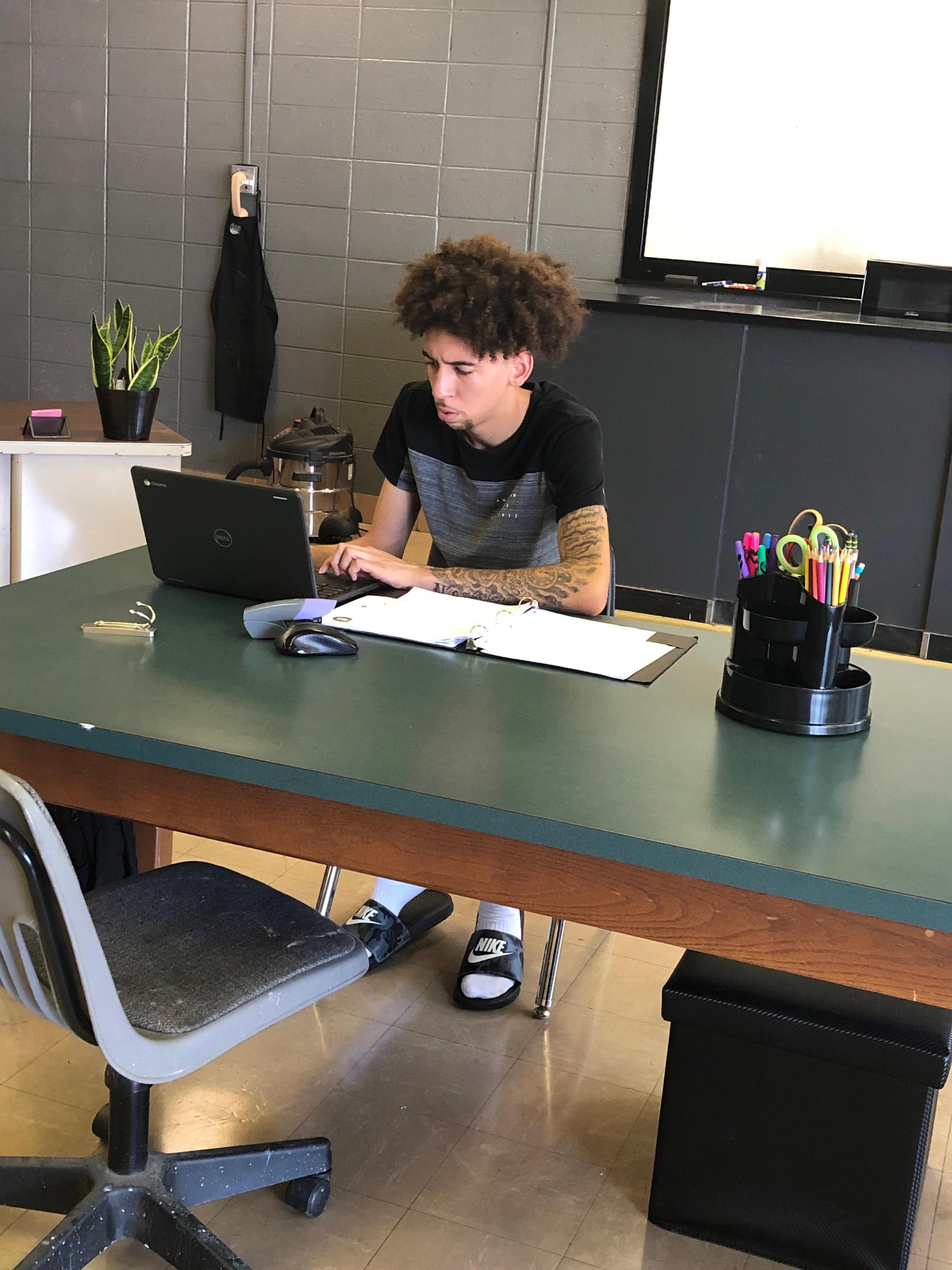 Student working on a laptop