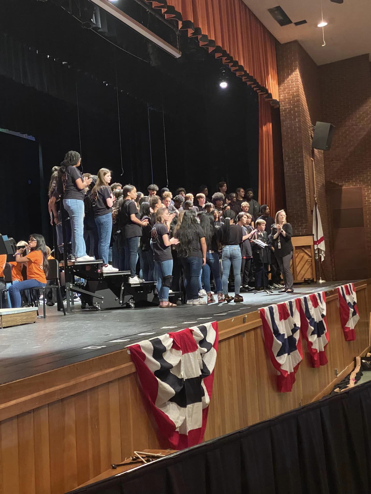 Students singing the national anthem