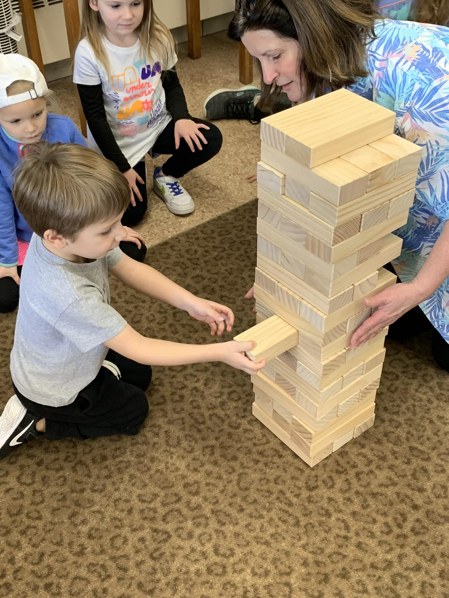 child learns with building blocks