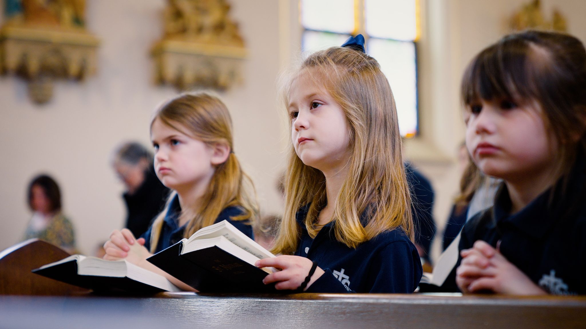 children read in mass