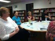 School/community participants gather at Waverly Intermediate School to receive a progress update and discuss information.
