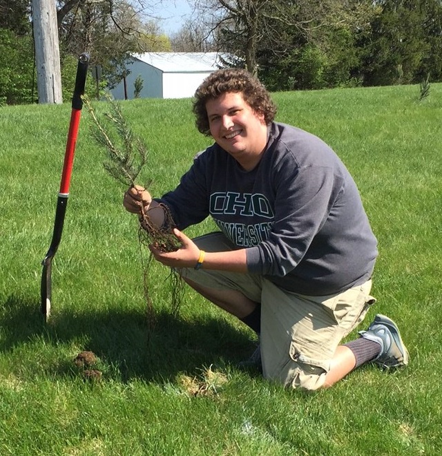 Photo of a student doing an outdoors activity.