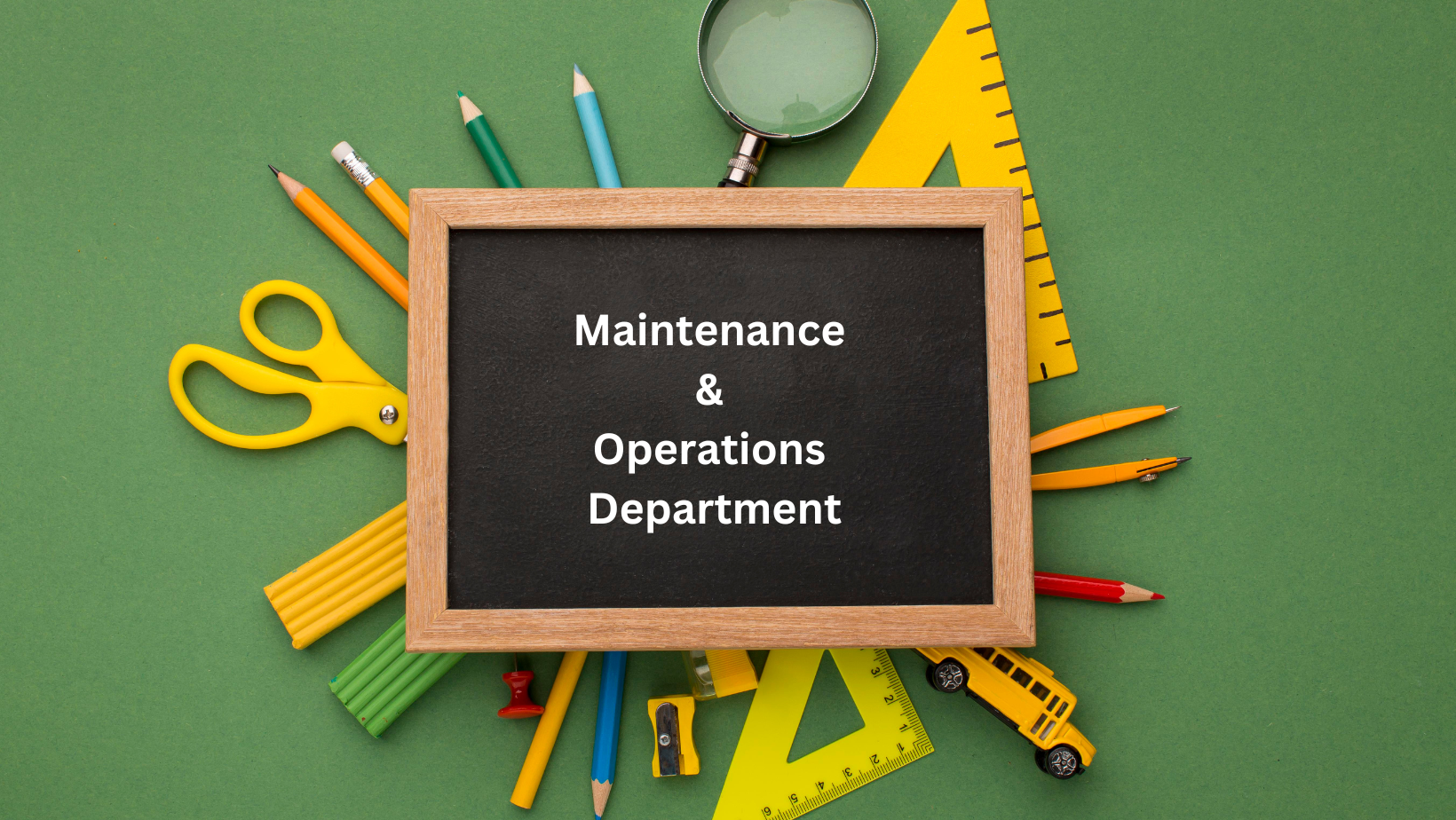Maintenance & Operations Department banner; chalkboard on top of a ruler, magnifying glass, pencils, pencil sharpener, compass, scissor