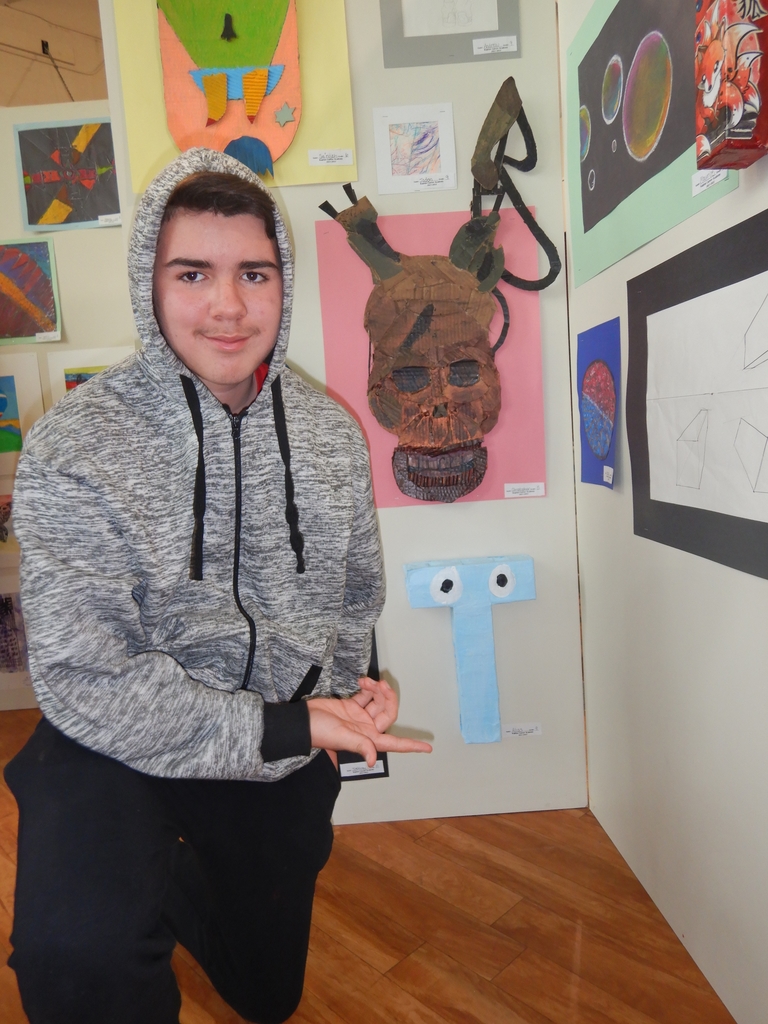 student with art work