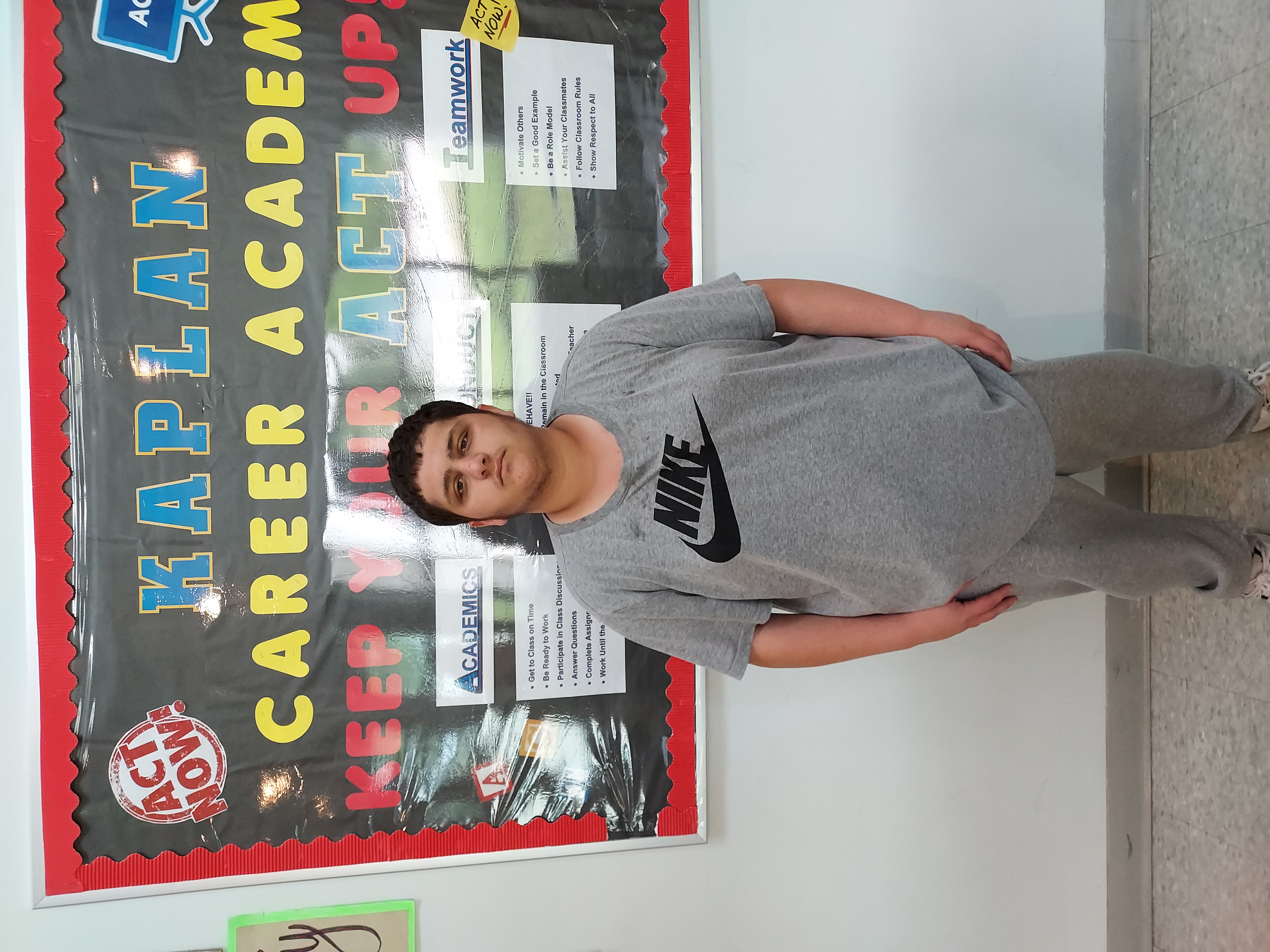 student with grey shirt
