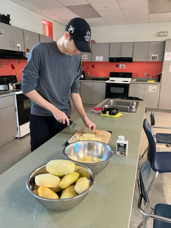 Student making french fries