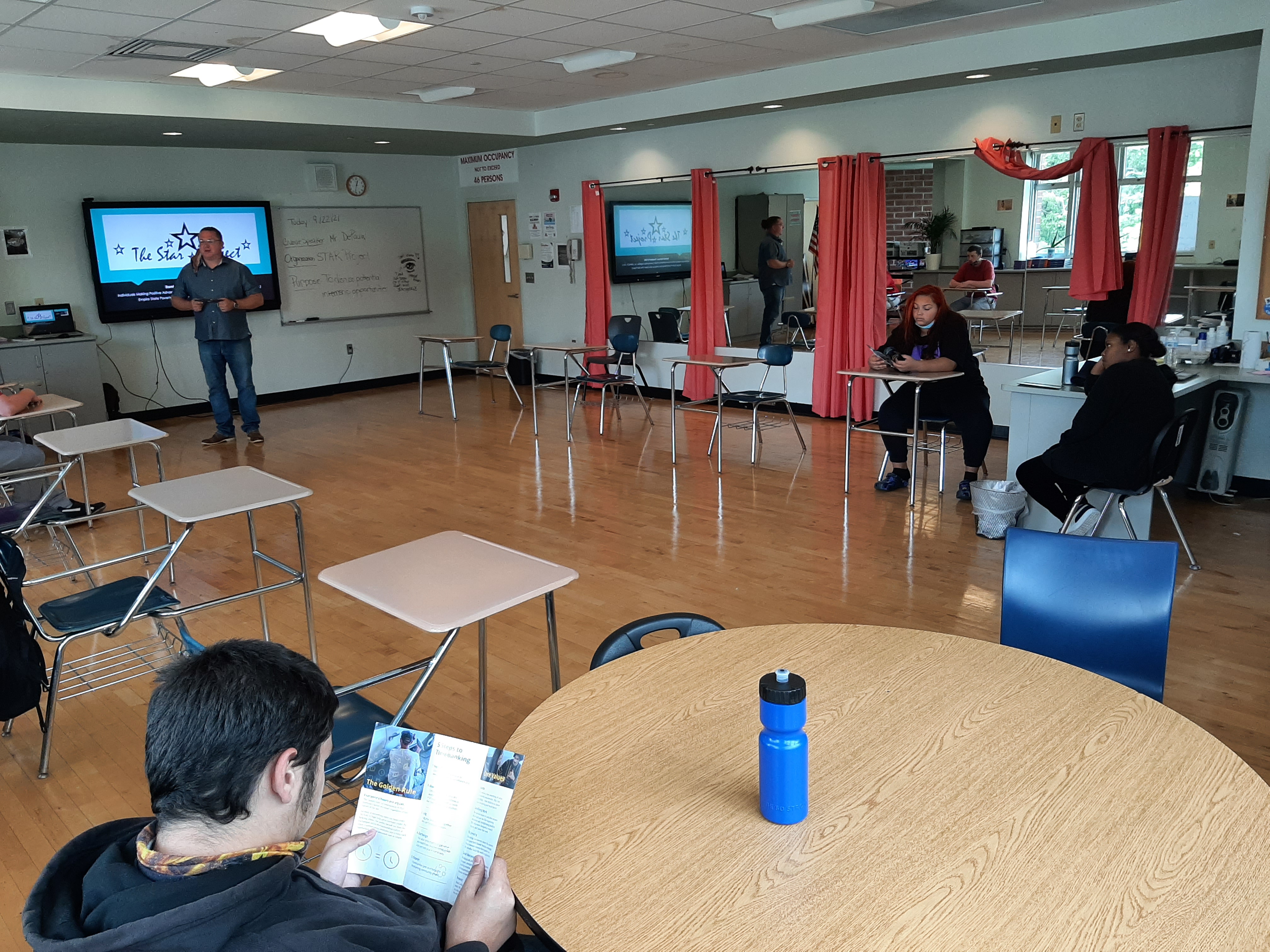 Students attending a presentation in the classroom
