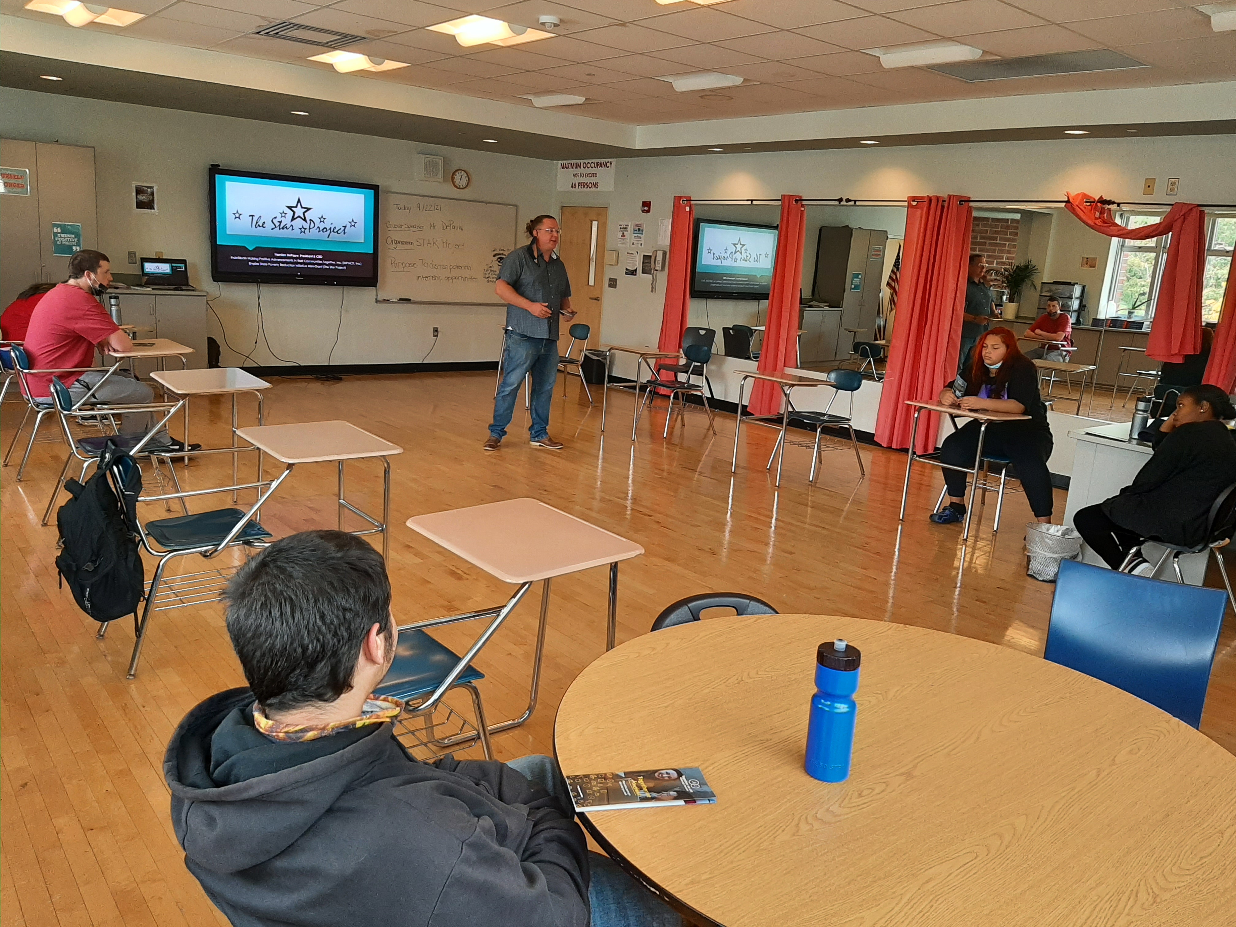 Students attending a presentation in the classroom