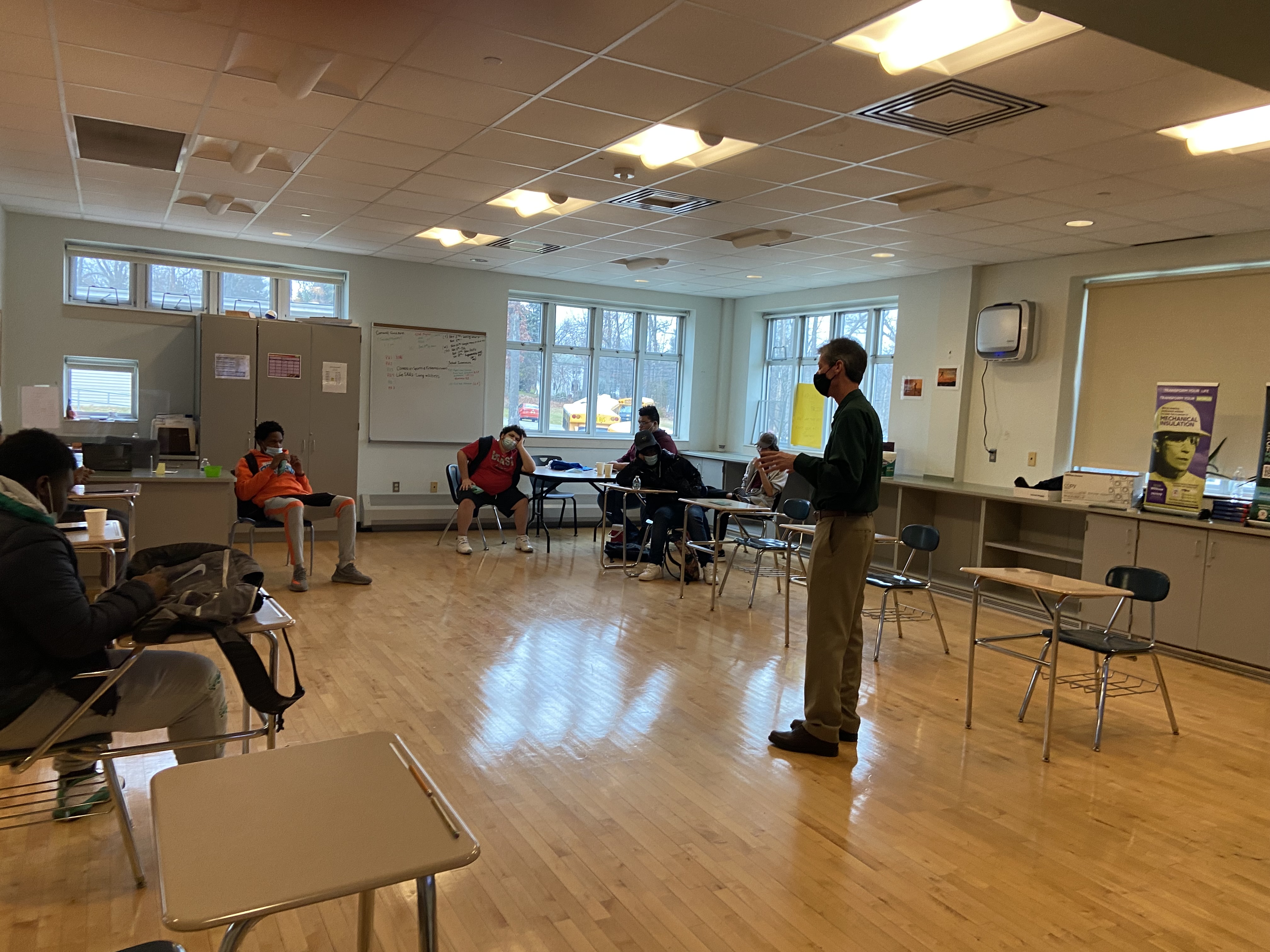 guest speaker talking with students in classroom