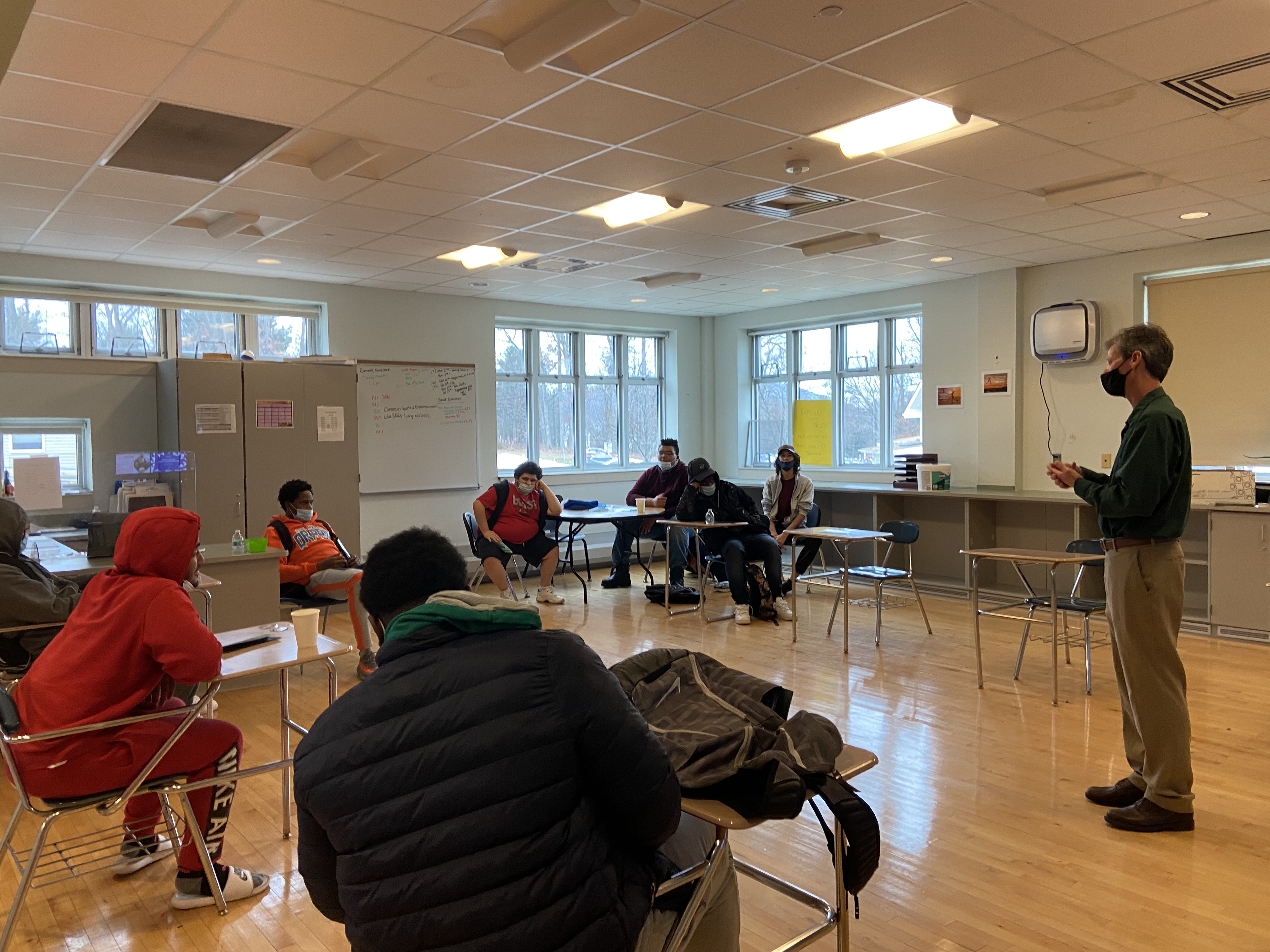 guest speaker talking with students in classroom