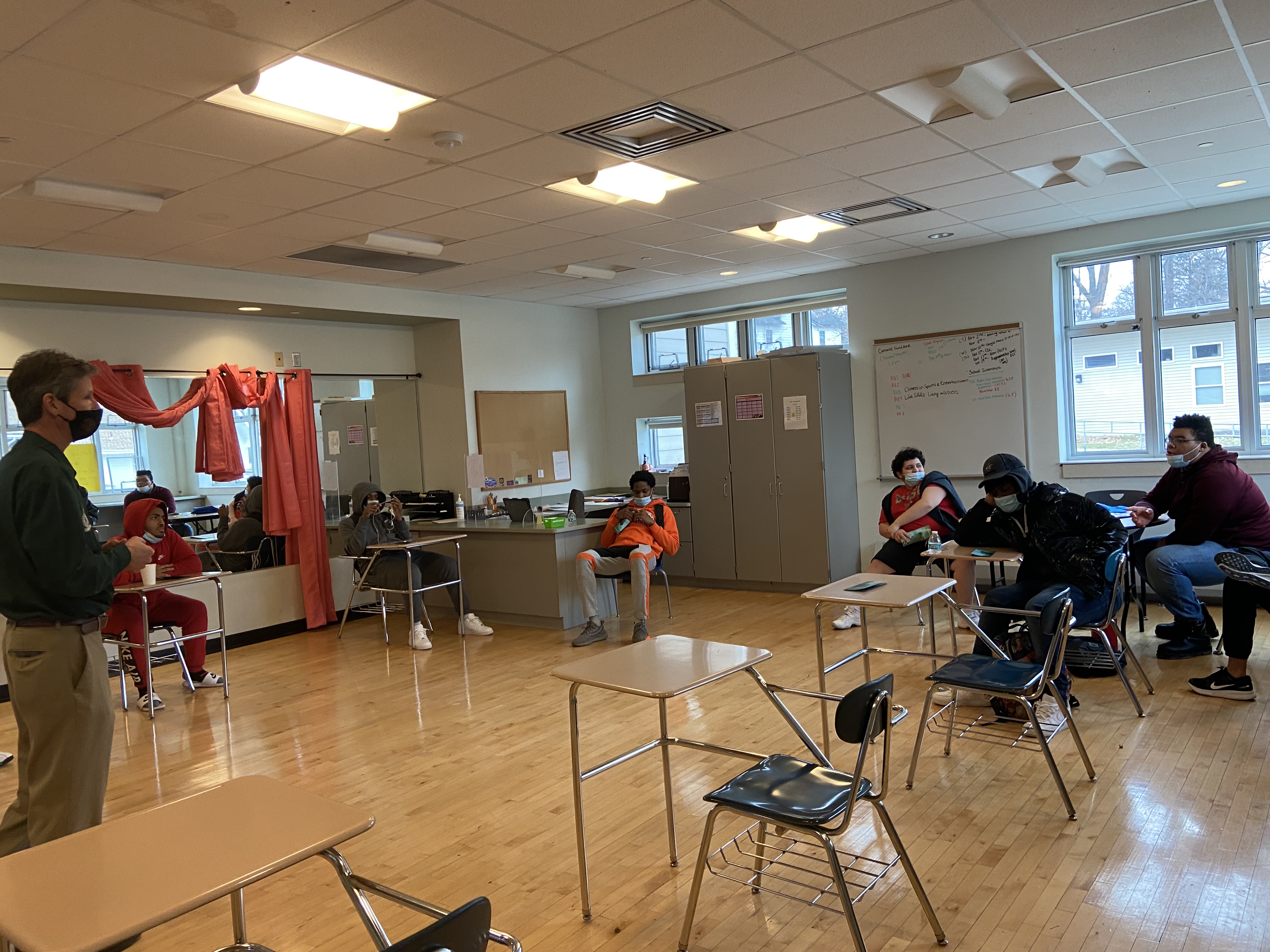 guest speaker talking with students in classroom