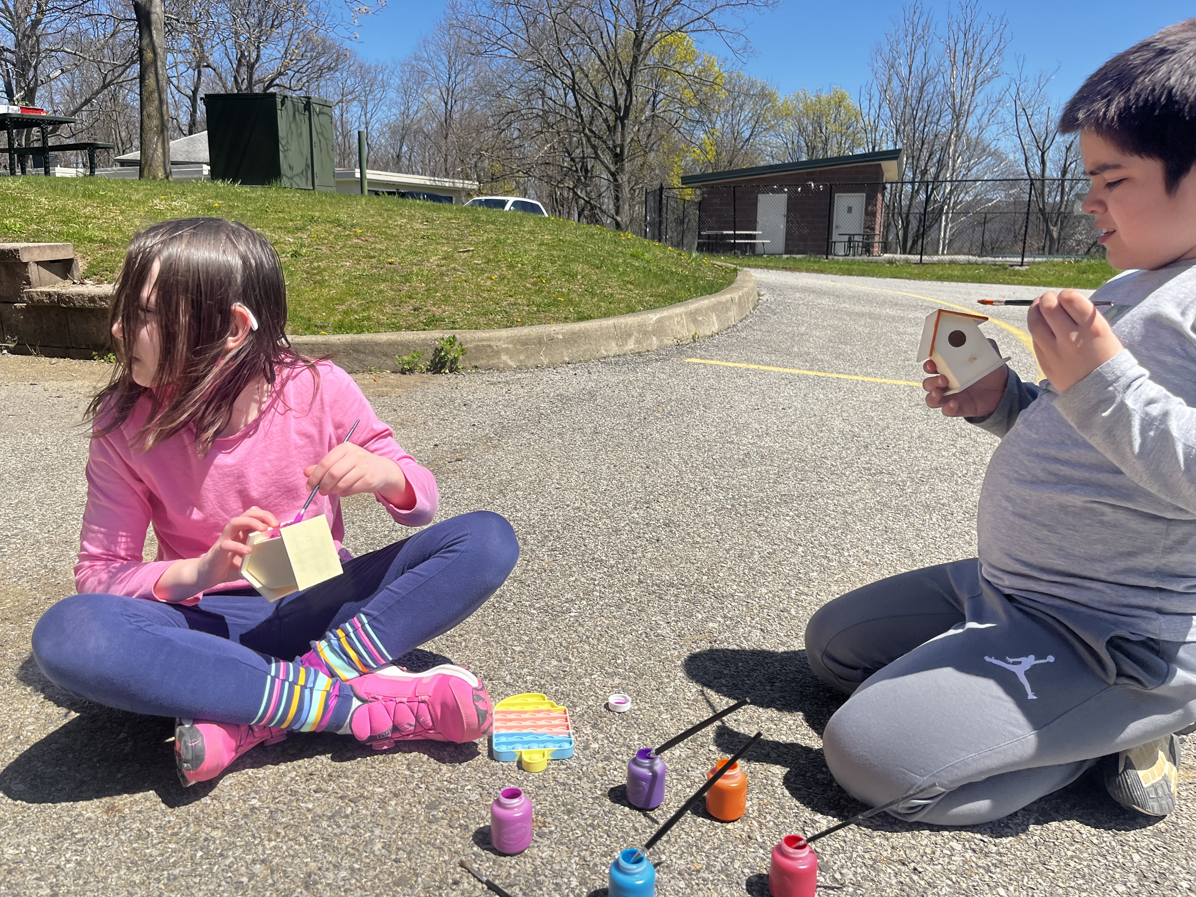 students outside painting