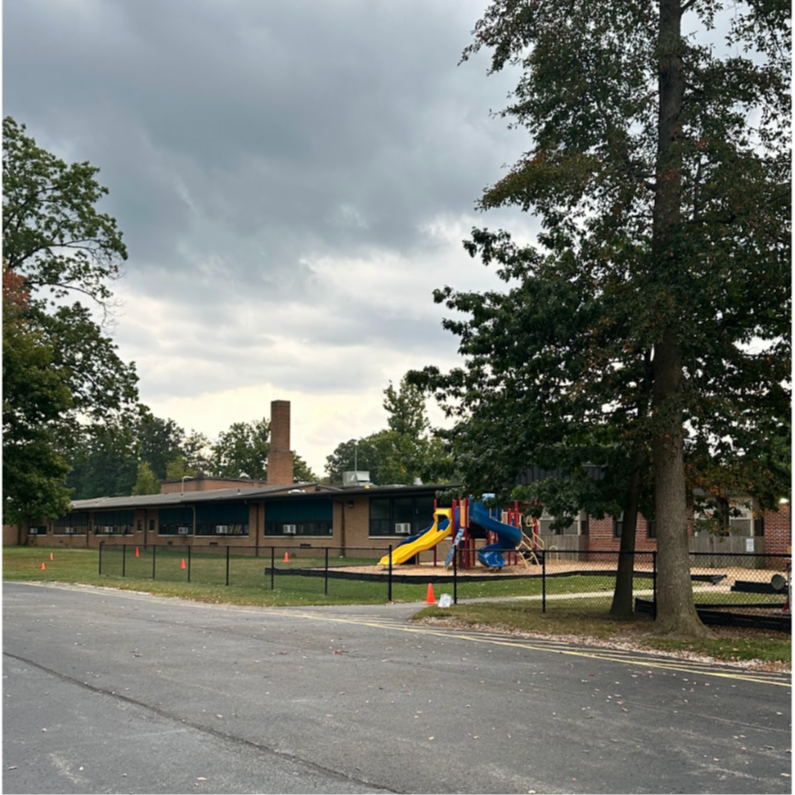 fence added to normandy bus area photo