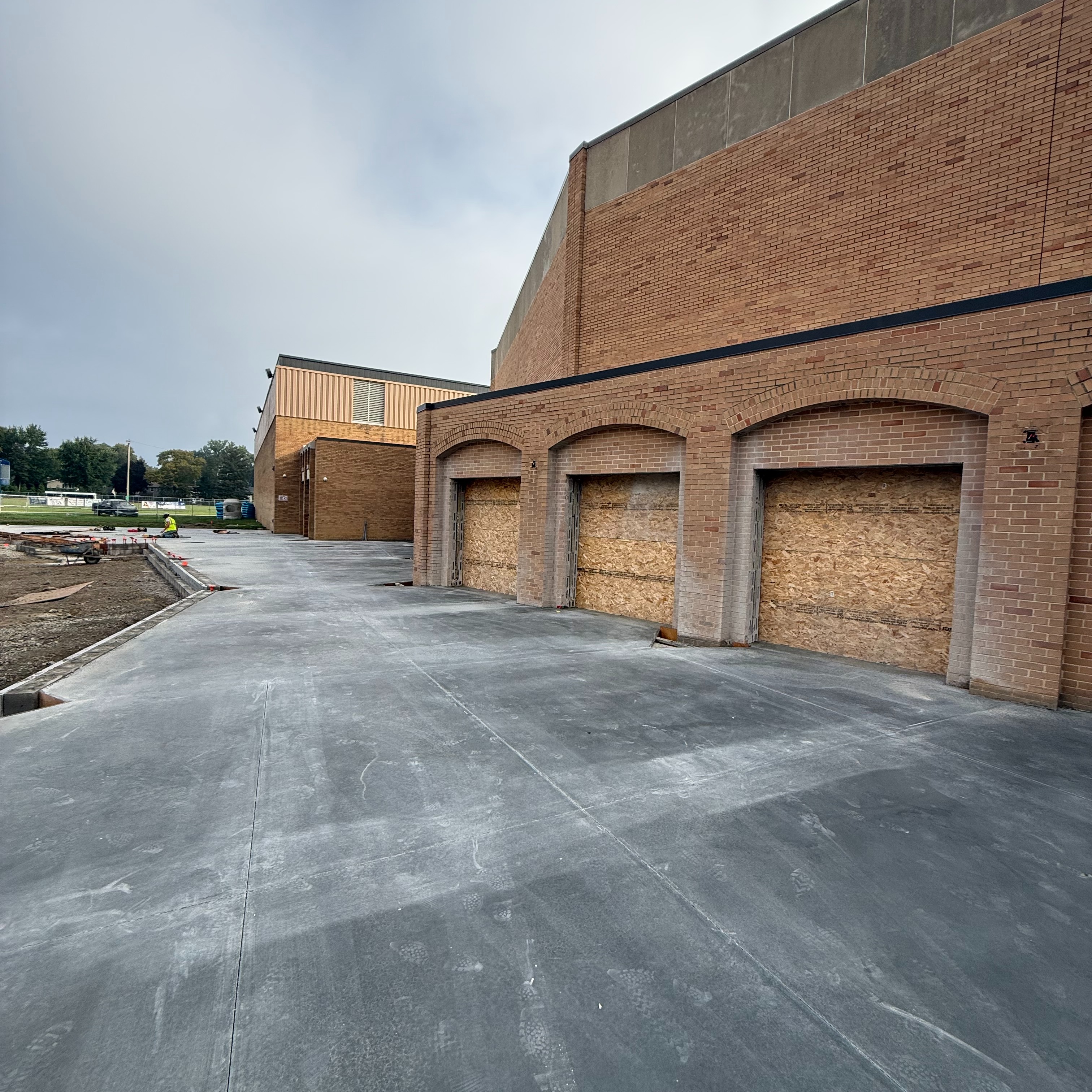 New foundation is laid outside the arches at Bay High School.