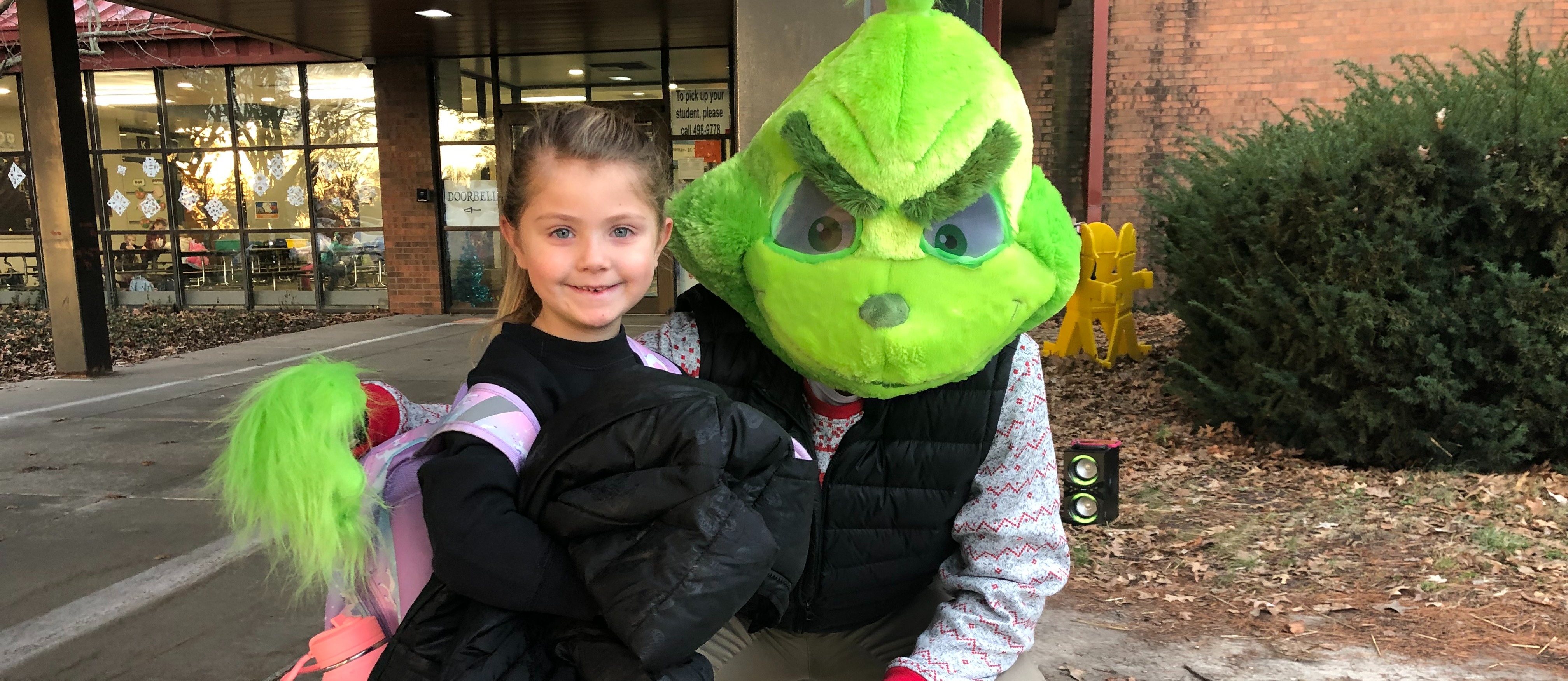 High five Friday with the Grinch 2023