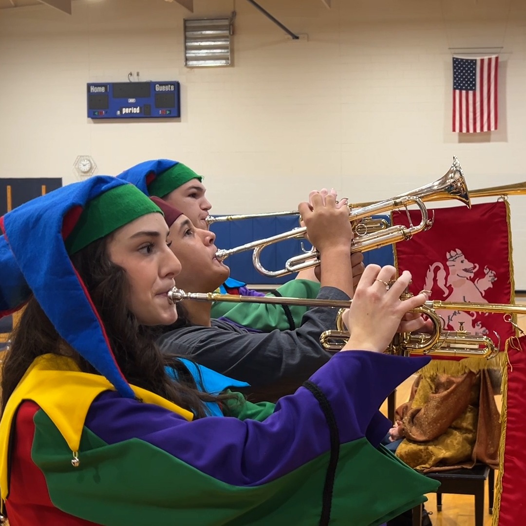 High School Madrigals visit 2-3 students