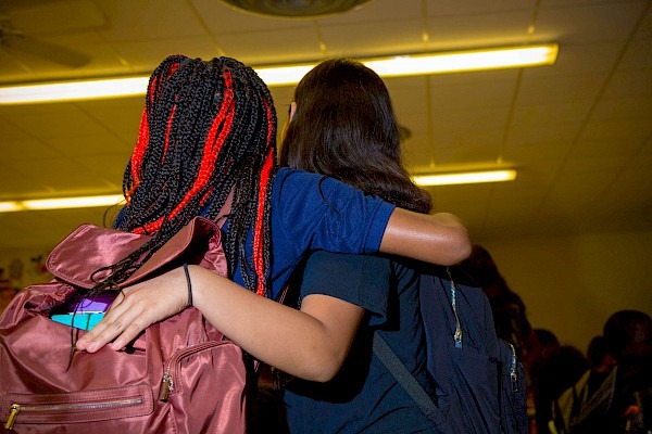 Girls Side Hugging