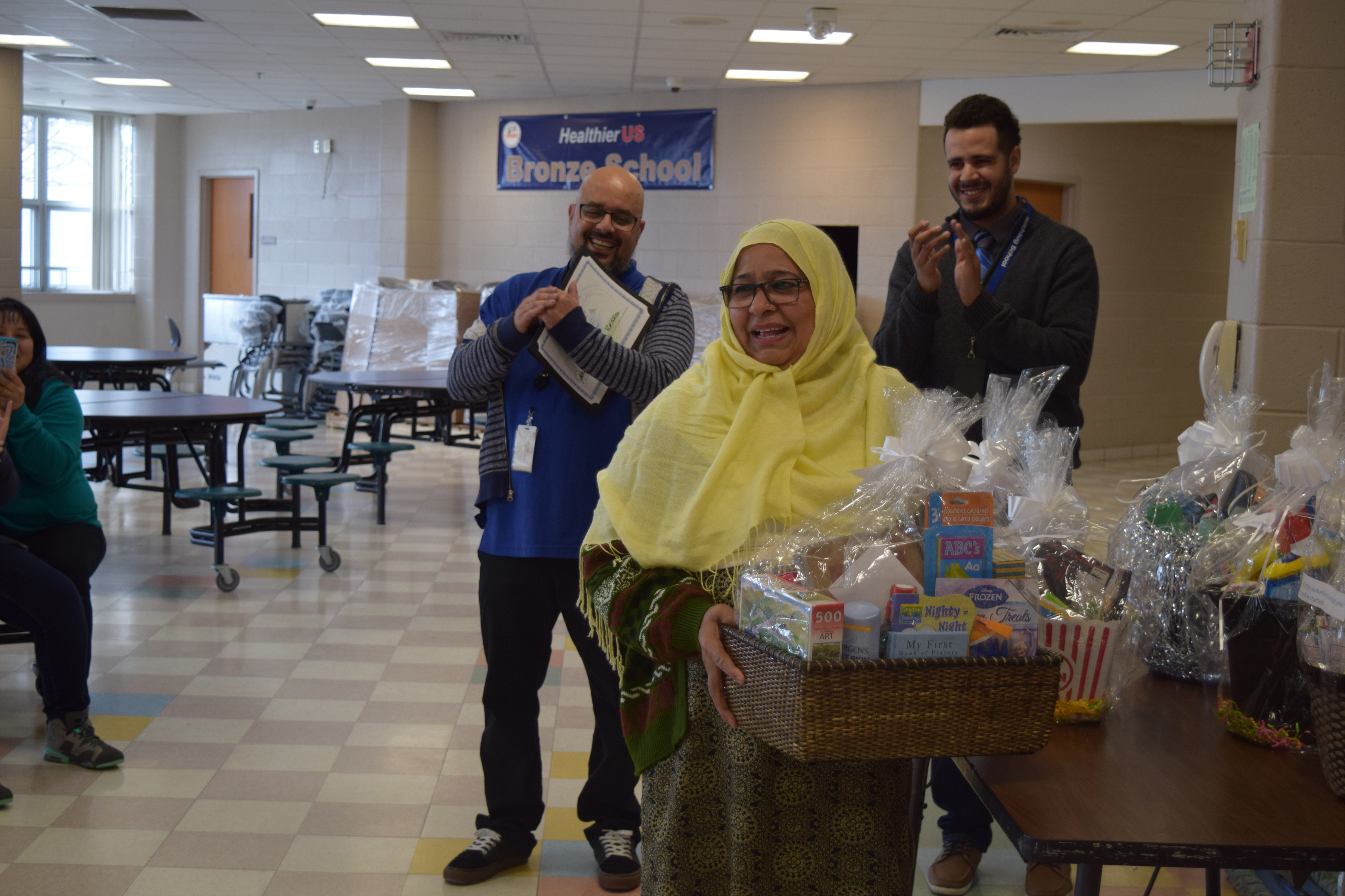 Parent receiving a gift basket