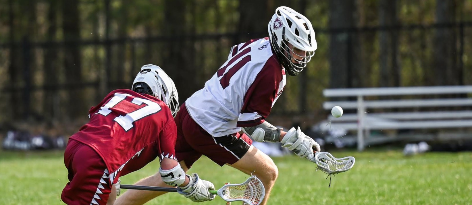 Freddy Hardy (right) wins a faceoff versus Westborough in a 7-4 win