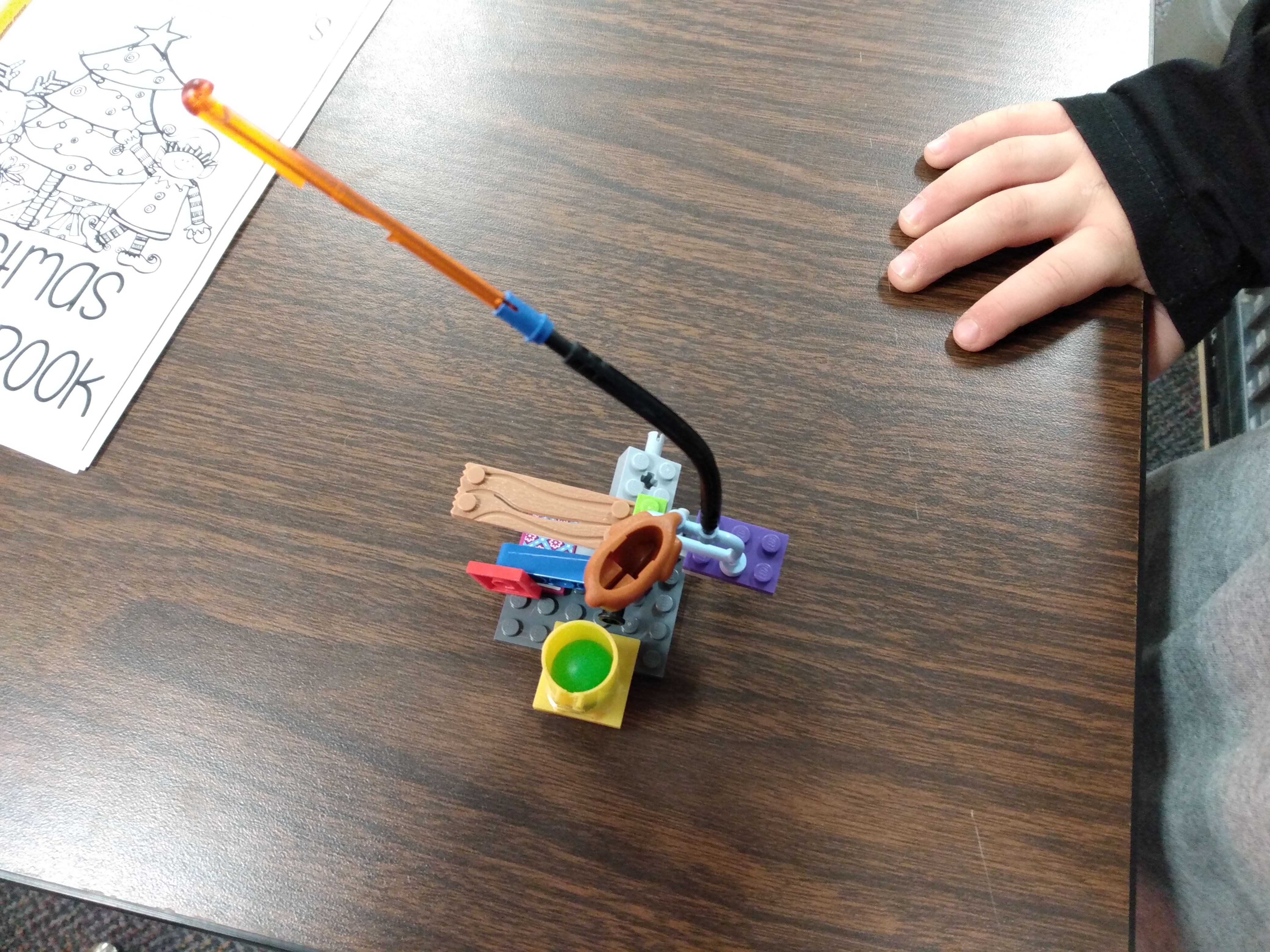 Student made Rube Goldberg machine. 