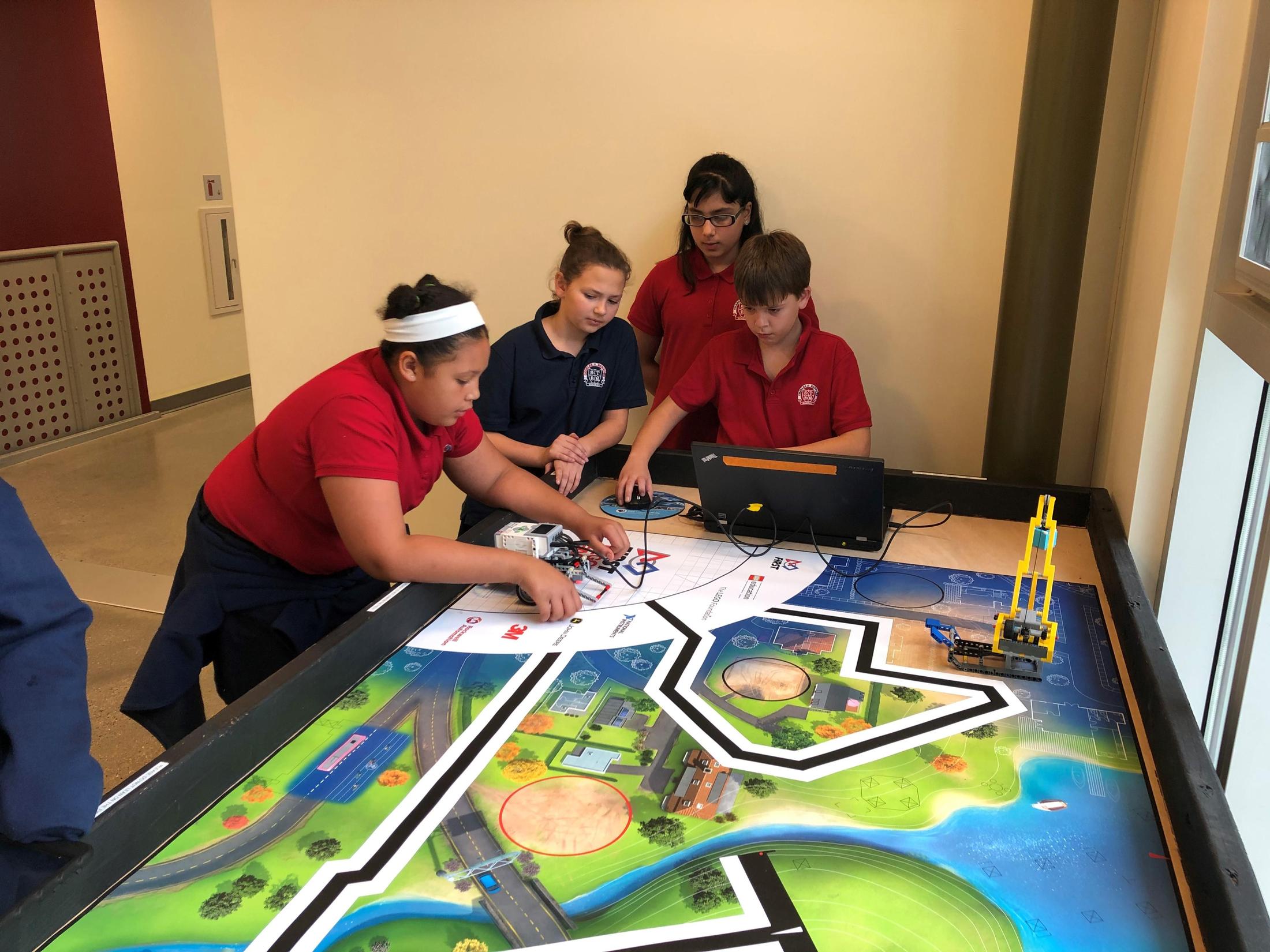 FLL Students working together