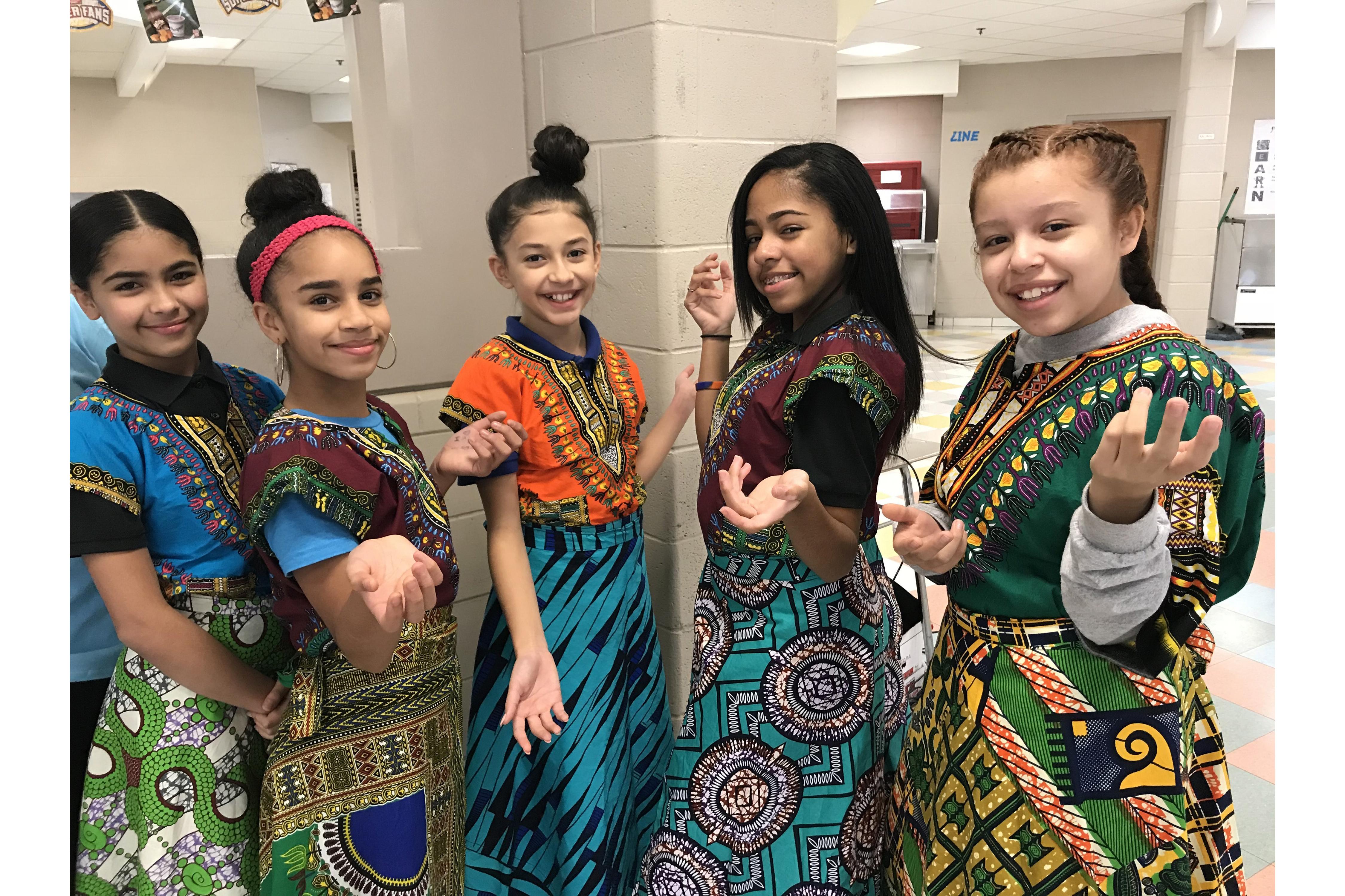 Female students in traditional dresses