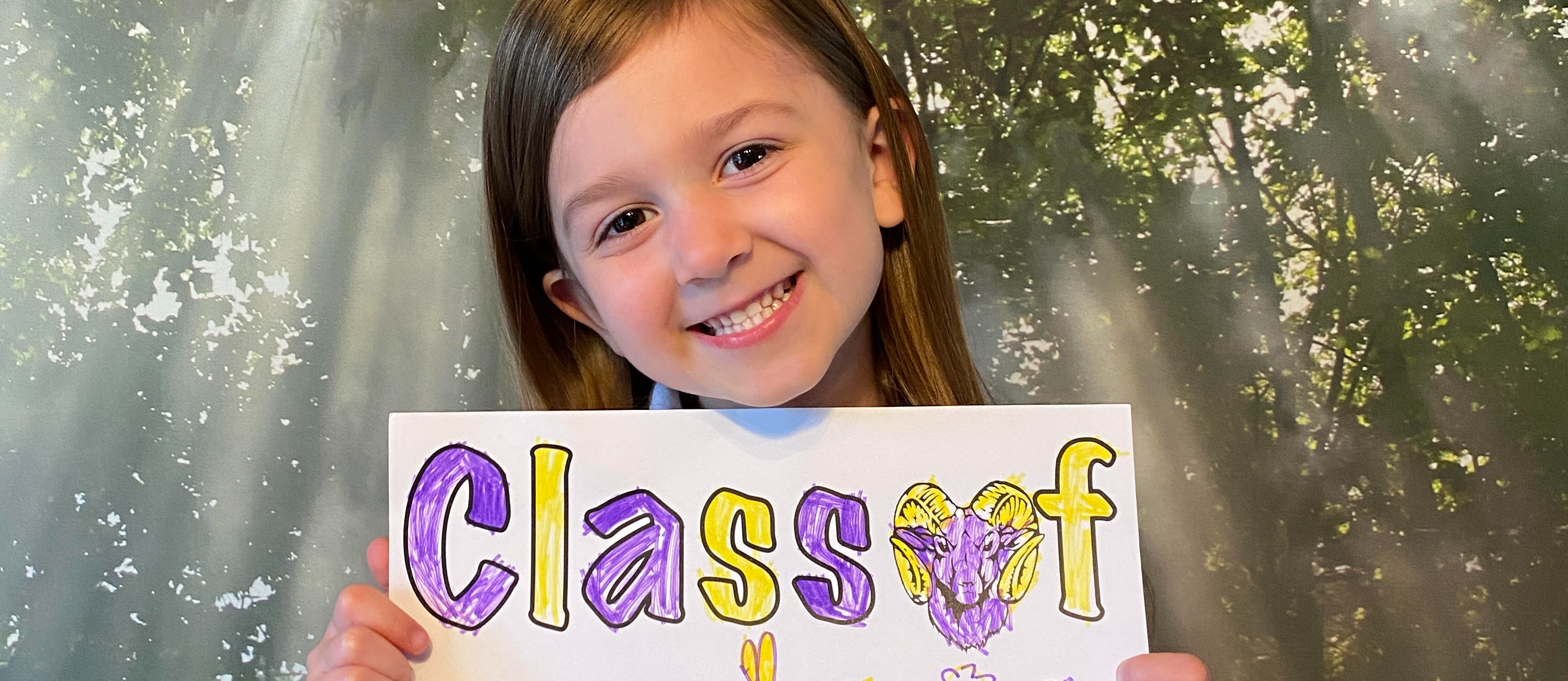 Student with Class of 2034 sign