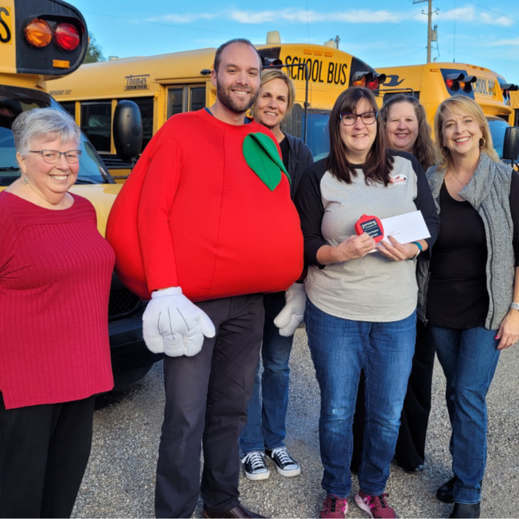 PIE delivering a grant award