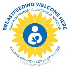 Yellow circular shape with white stick person holding a blue stick person infant "Breast feeding welcome here" in blue text around the image above and "Kansas Breastfeeding Coalition" in blue text below