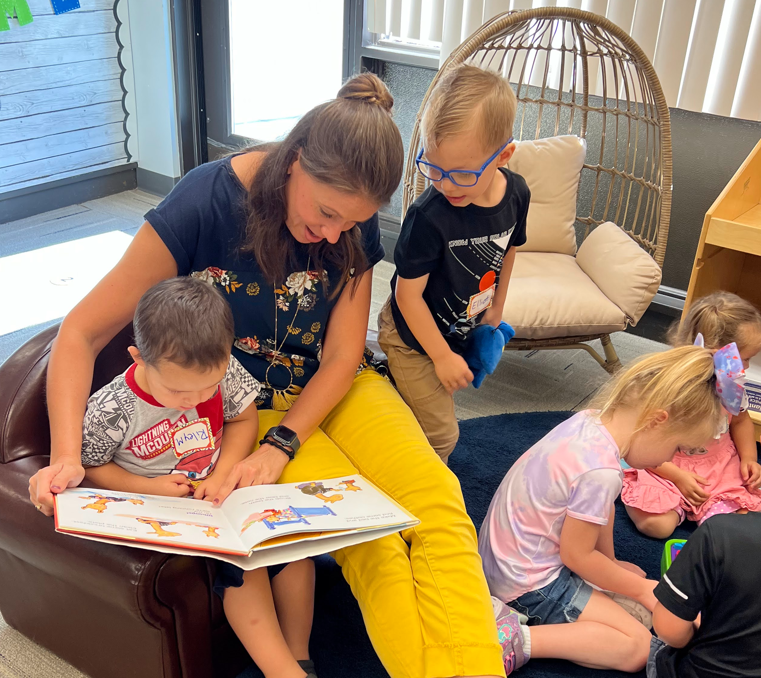 Ms. Lambert reading to friends