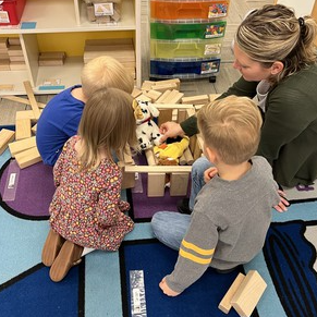 para with students building pet homes