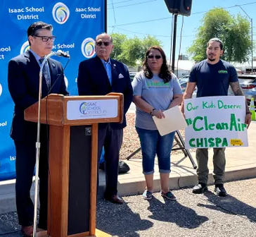 Superintendent, Governing Board Member, and Members of Chispa and Environmental Organization gather together for a press conference about electric school buses 