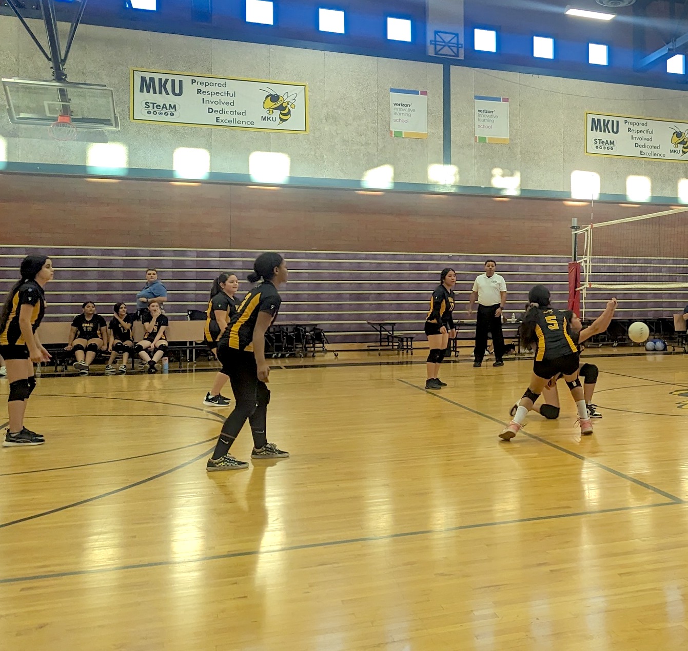 middle school teams playing volleyball