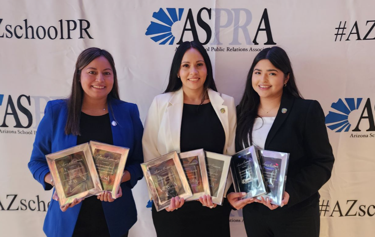 Communications Department holding 7 awards presented by the Arizona School Public Relations Association 