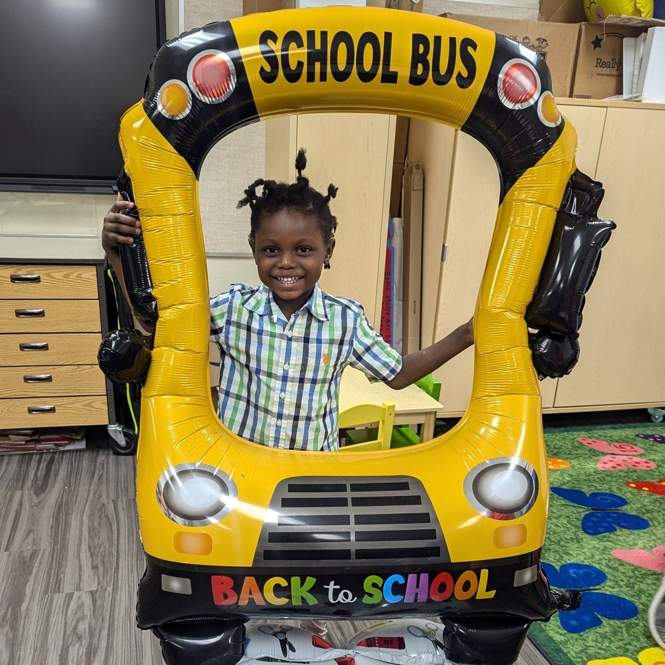 elementary student pose for photo