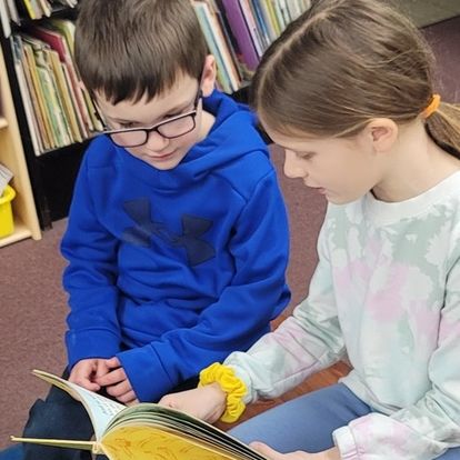 Students reading together