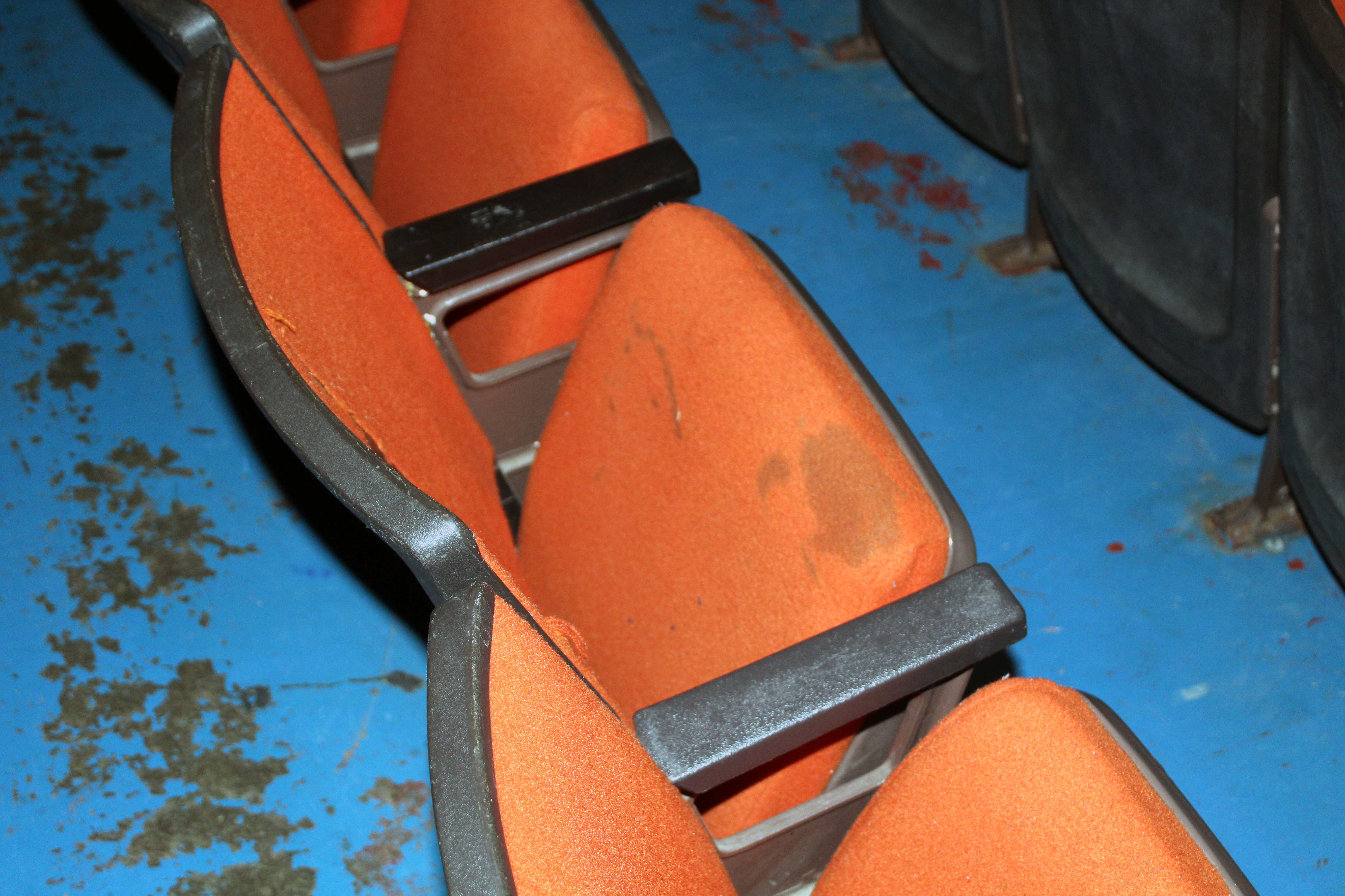 worn auditorium seating in high school