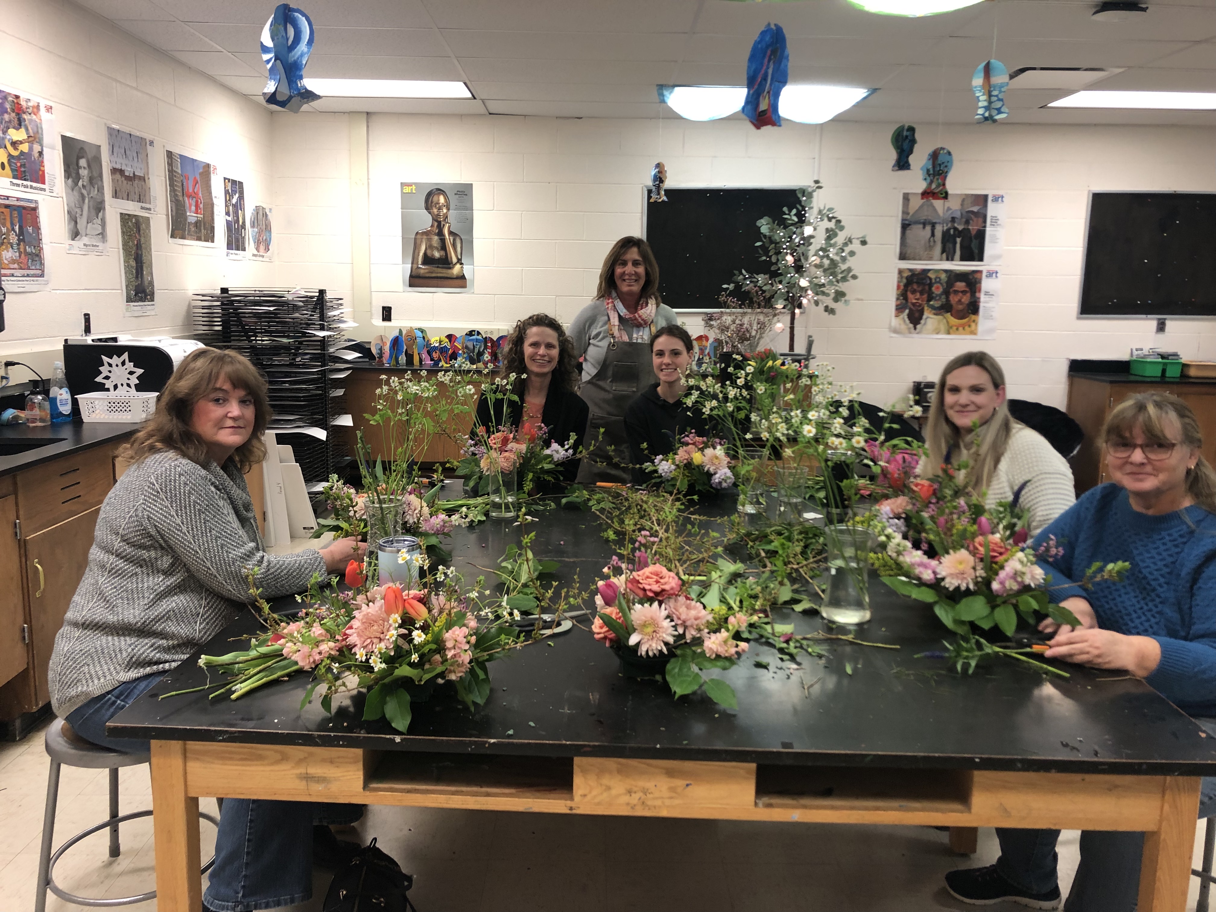 women making flower arrangements 
