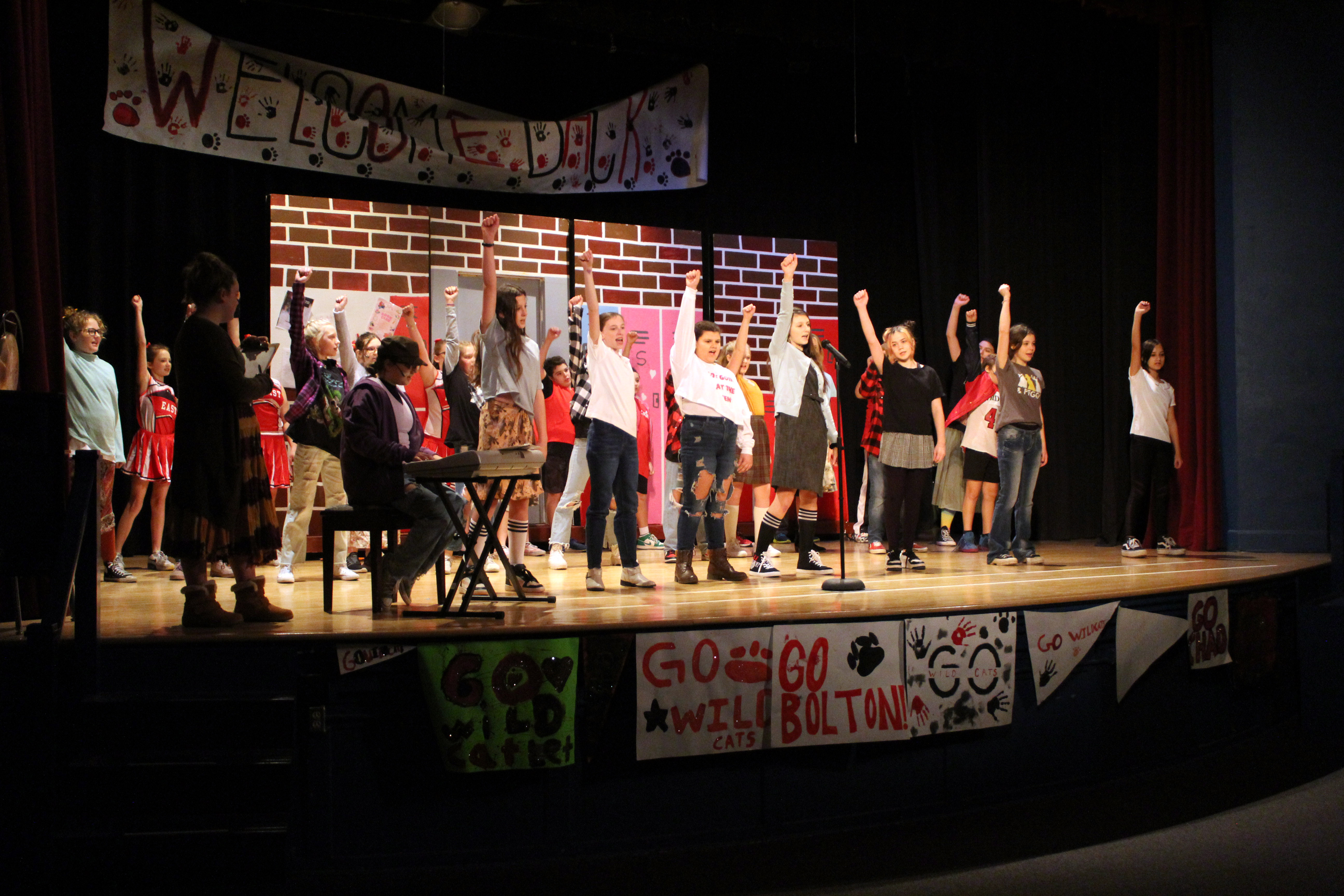 CMS students on stage during their production of High School Musical