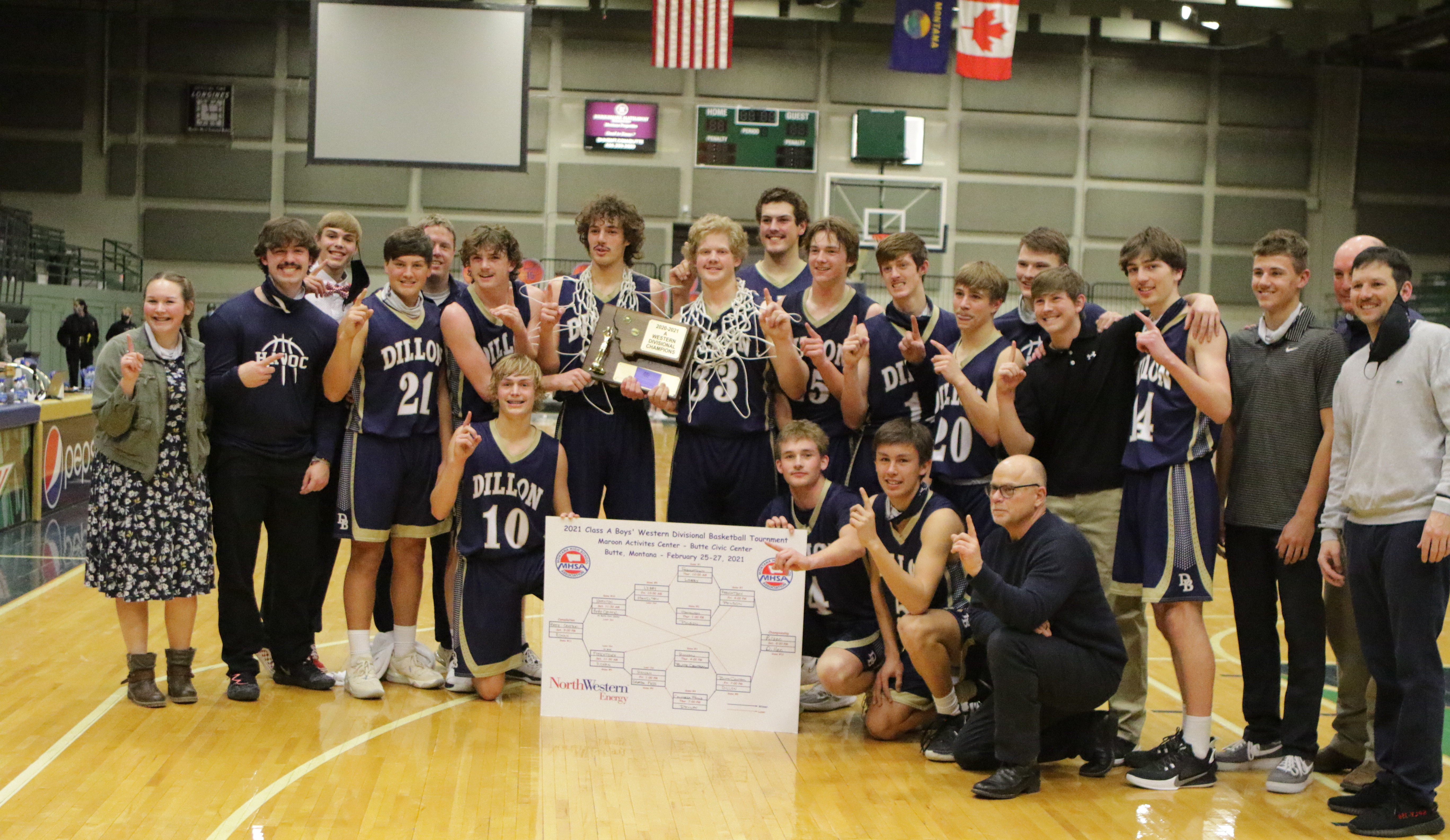 An image of the basketball team after winning the State Championship in 2015