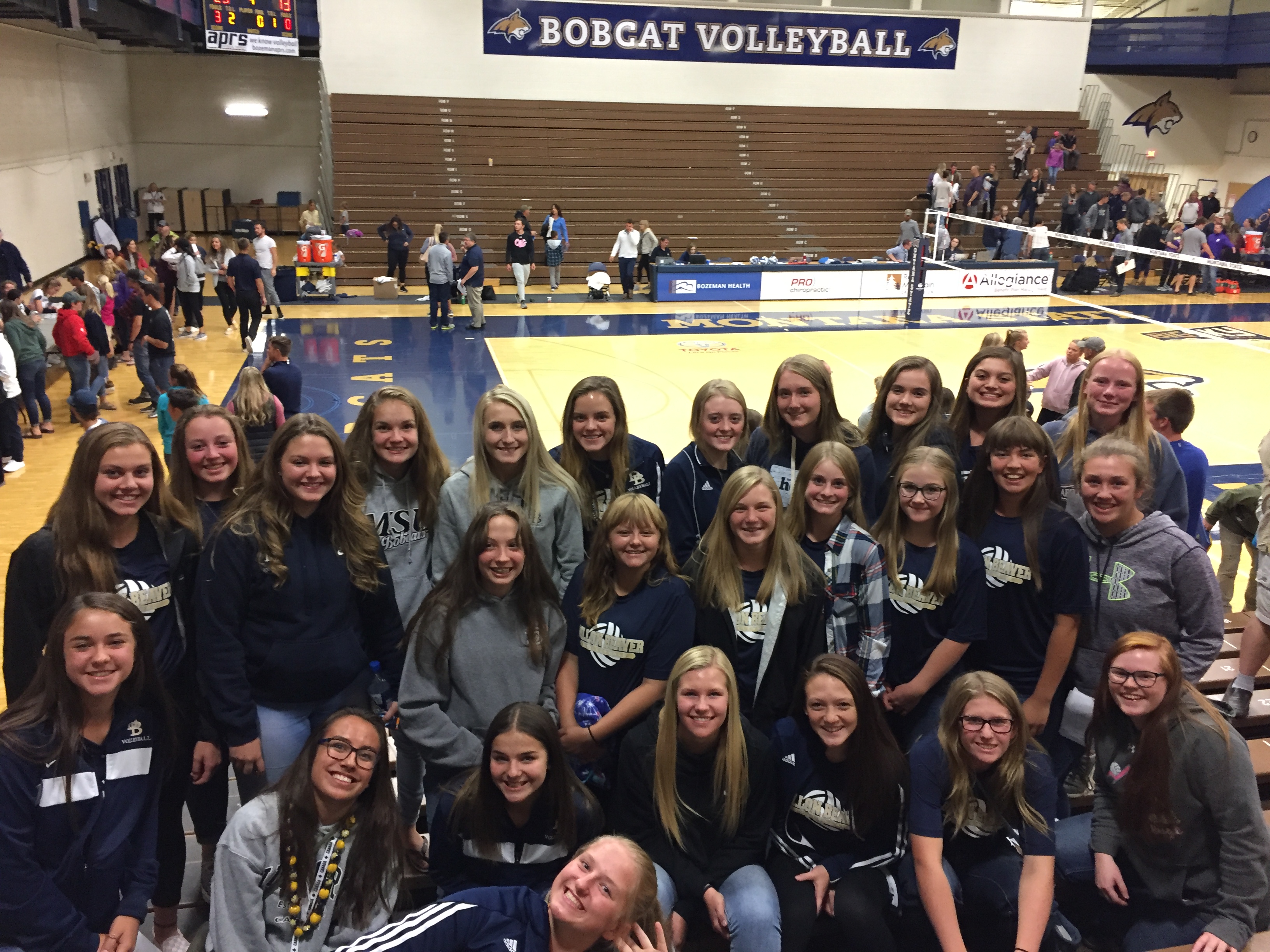 A photo of the volleyball team on a trip to watch the MSU Bobcats in August 2018