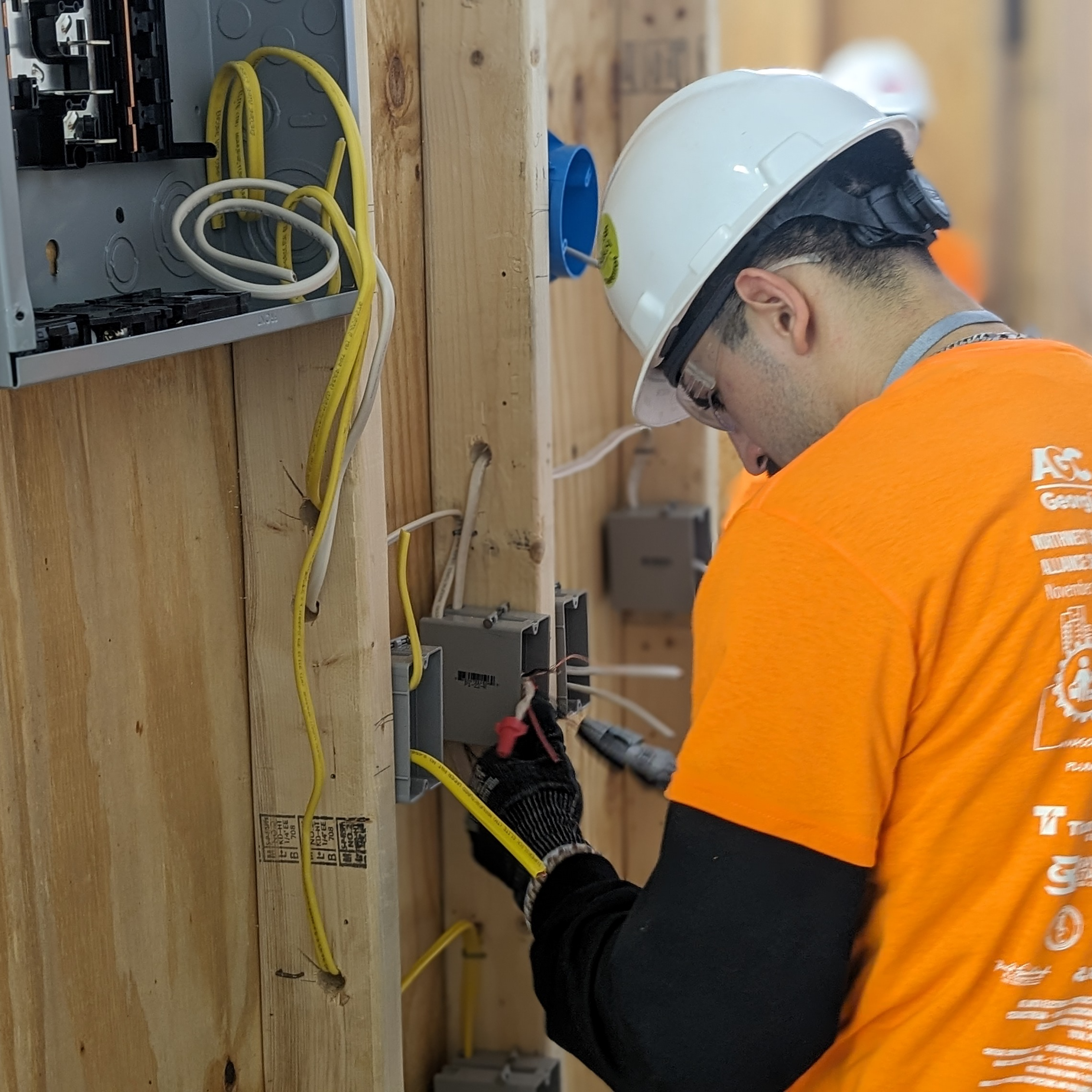 CCA Student doing electrical work. 